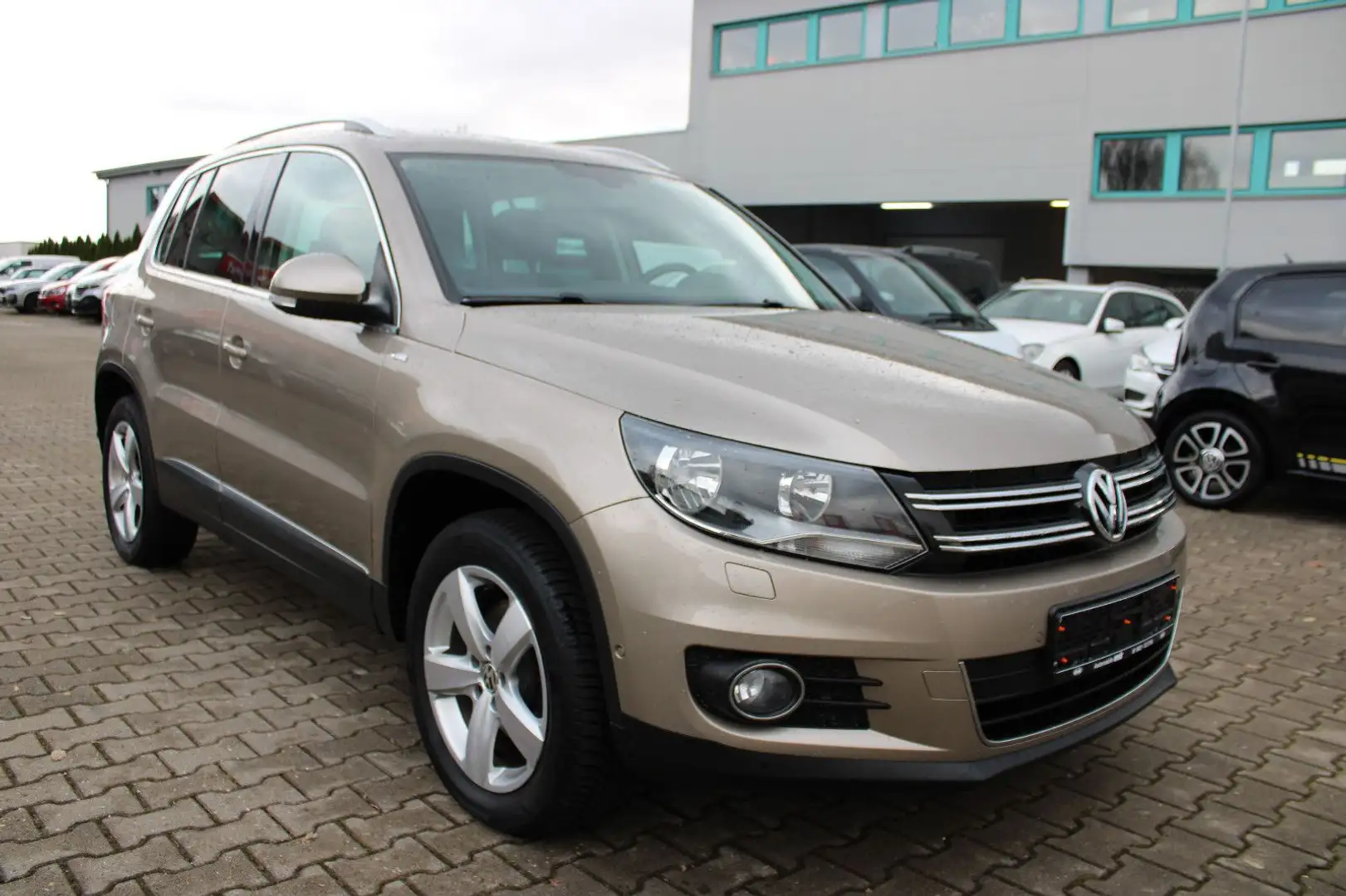 Volkswagen Tiguan 1.4 TSI 4MOTION CUP Sport & Style Braun - 2