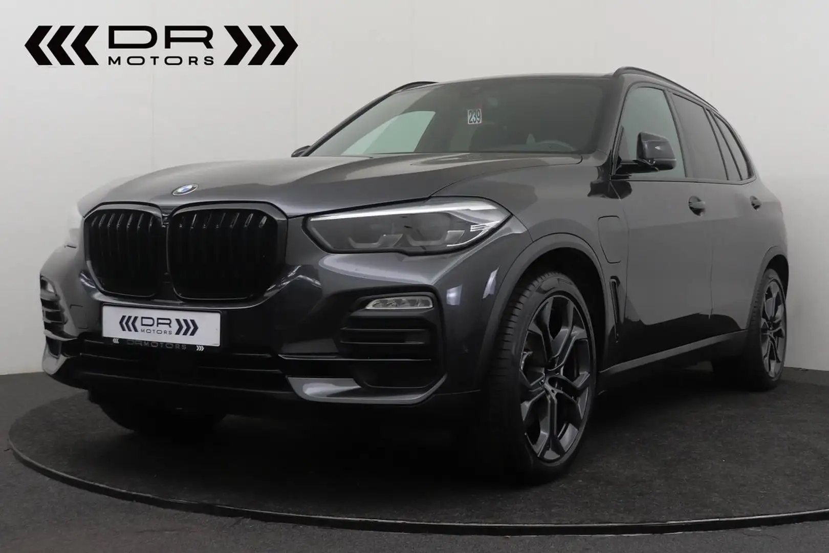 BMW X5 45e xDrive PHEV - COMFORTZETELS - DAB - APPLE C... Grijs - 1