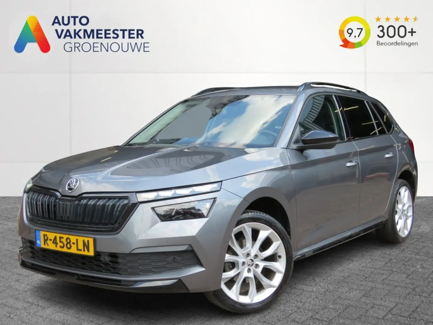 Skoda Kamiq 1.0 TSI  110pk SPORT BNS / Camera /  Stoelverw / L Grijs - 1