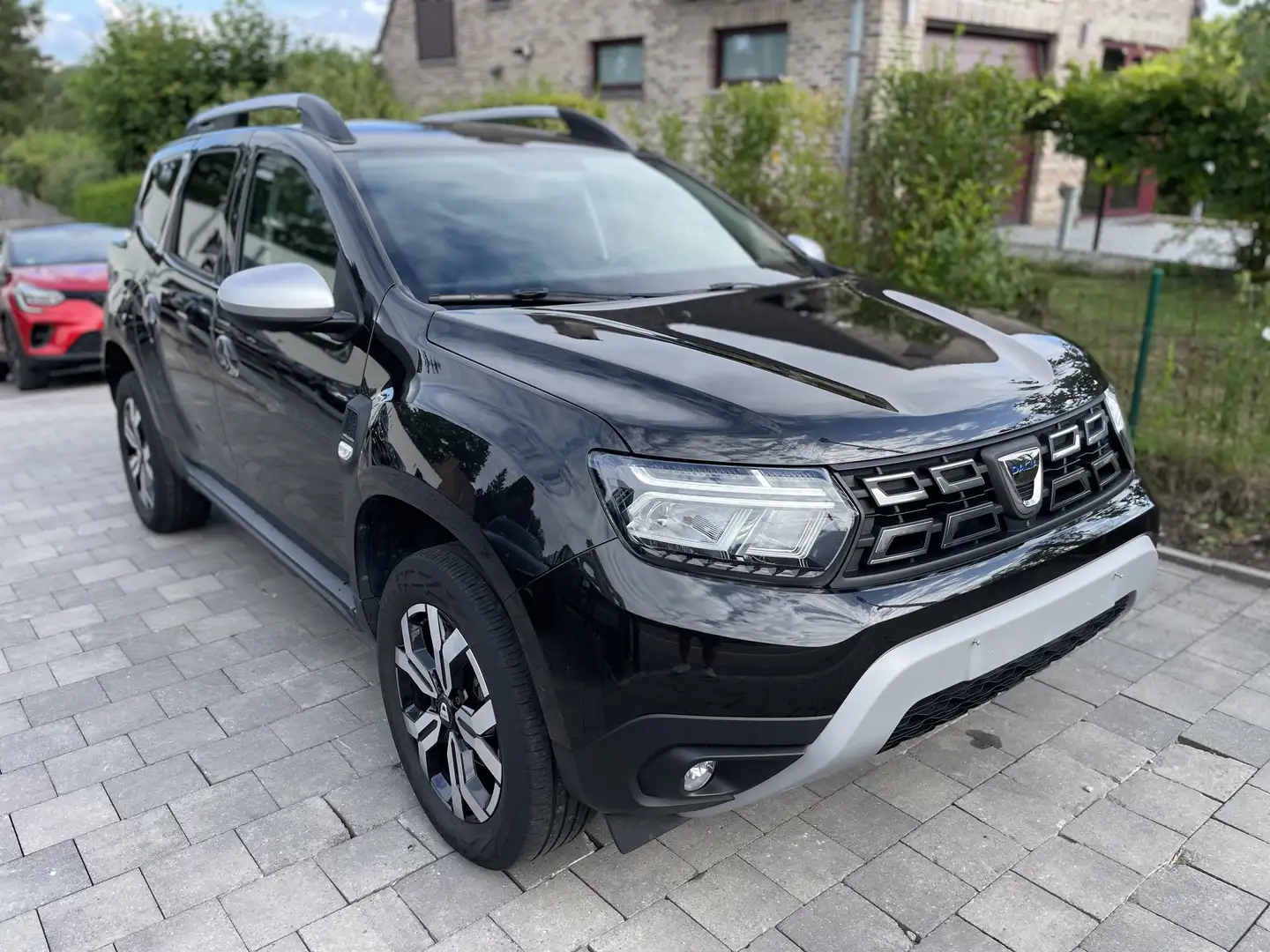 Dacia Duster DUSTER 1.3i 2WD PRESTIGE AUTOMAAT/LEDER/36000KM/E6 Zwart - 1