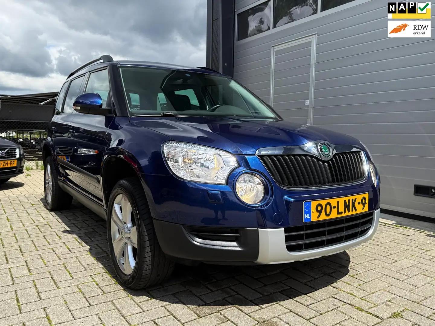 Skoda Yeti 1.2 TSI Elegance - PDC - Cruise Control - Trekhaak Blauw - 1
