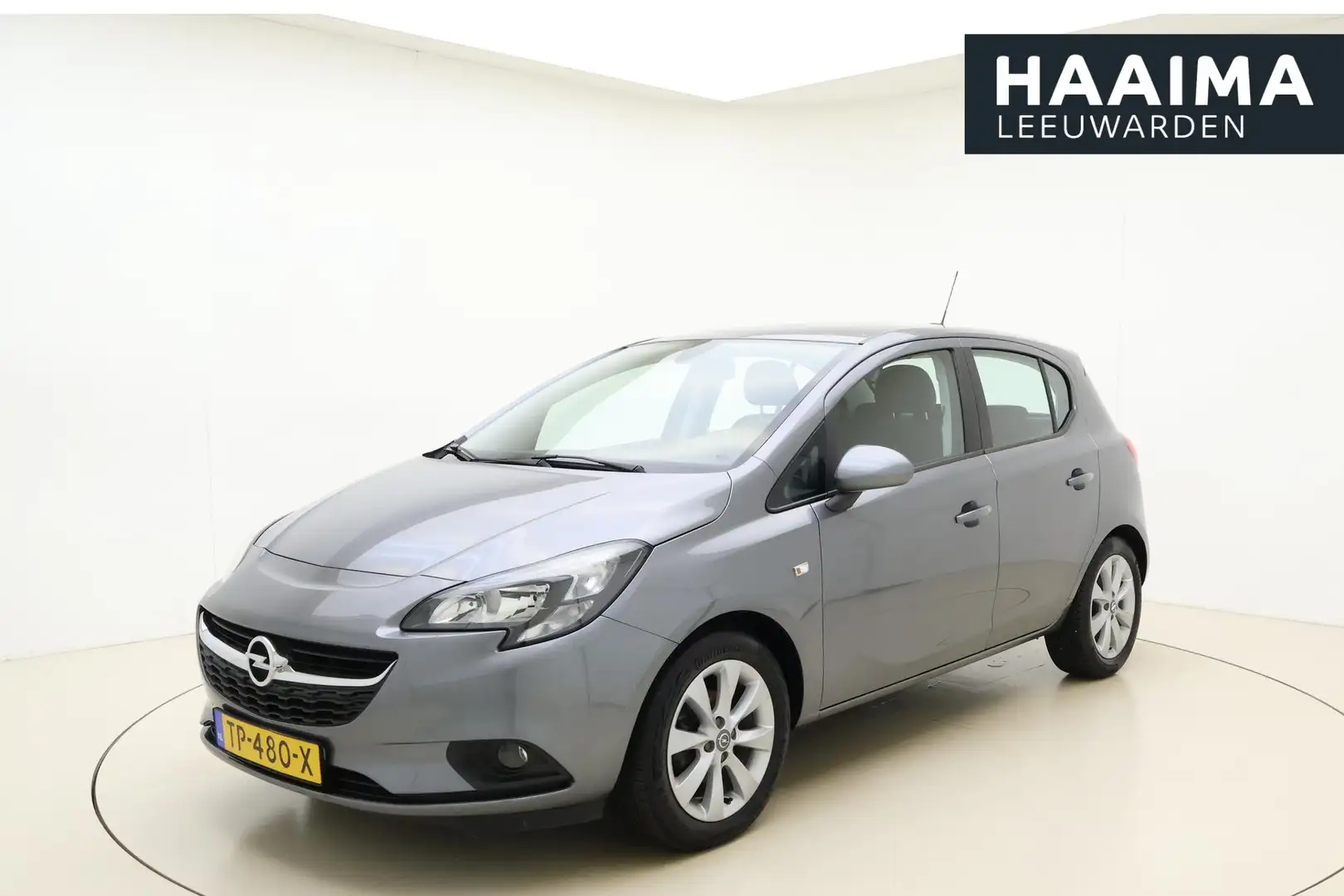 Opel Corsa 1.4 Favourite Airco | Cruise Control | Navigatie | Grijs - 1