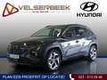 Hyundai TUCSON 1.6 T-GDI PHEV Premium Sky 4WD * 4897 km * Grijs - thumbnail 1