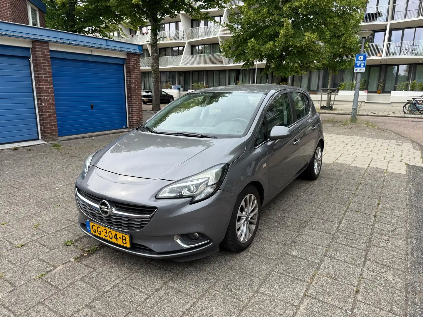 Opel Corsa 1.3 CDTI Cosmo 5drs Euro 6 1-Eigenaar Grijs - 1