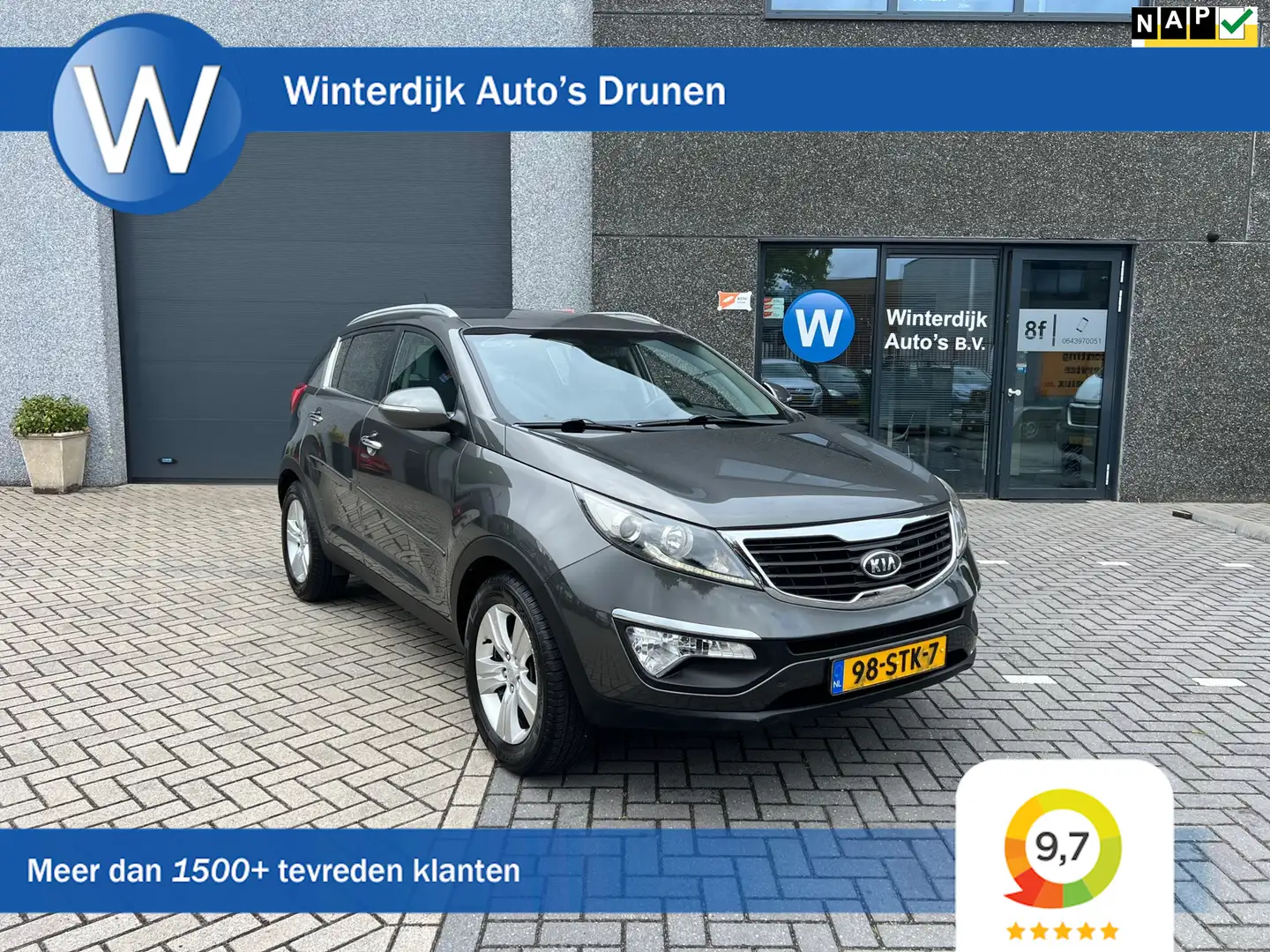 Kia Sportage 2.0 X-ecutive Plus Pack Automaat Clima Cruise Navi Gris - 1
