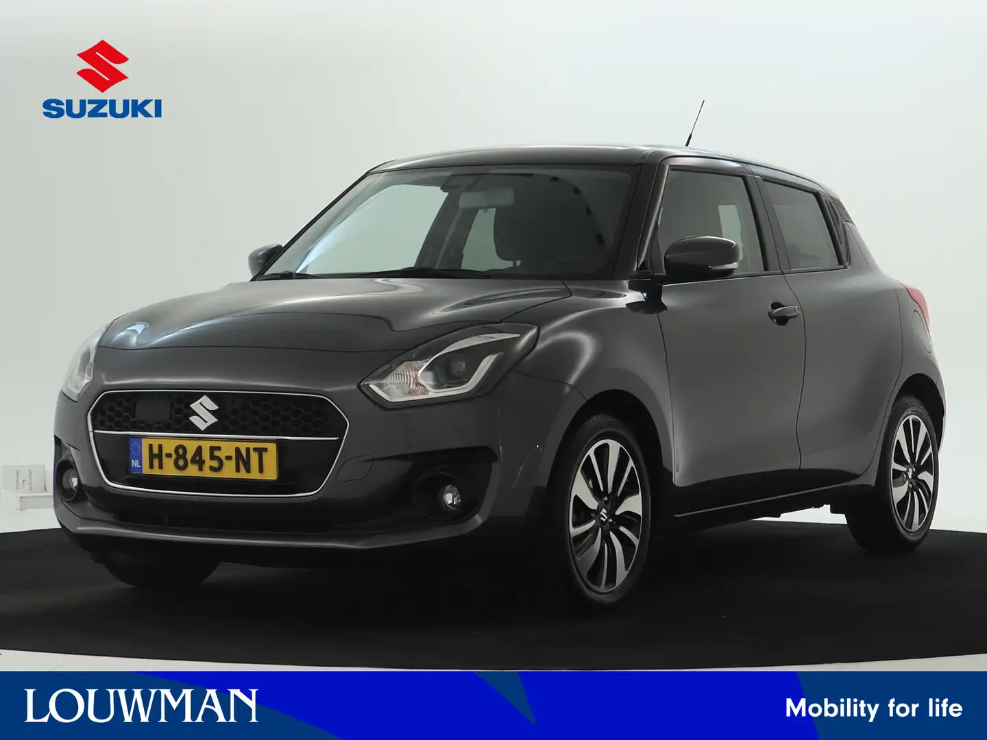 Suzuki Swift 1.2 Stijl Smart Hybrid | 1ste eig. | Navi | Climat Gris - 1