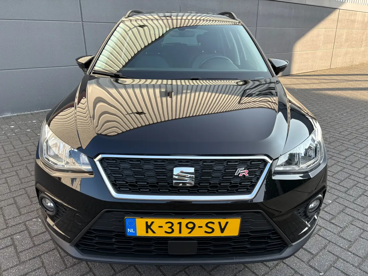 SEAT Arona 1.0 TSI Style FR Business*APK*NAP*AIRCO*CRUISE*NAV Zwart - 2
