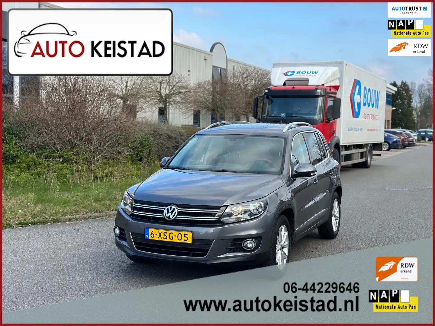 Volkswagen Tiguan 1.4 TSI Sport&Style CLIMA/NAVIGATIE! NIEUWSTAAT! O Grijs - 1