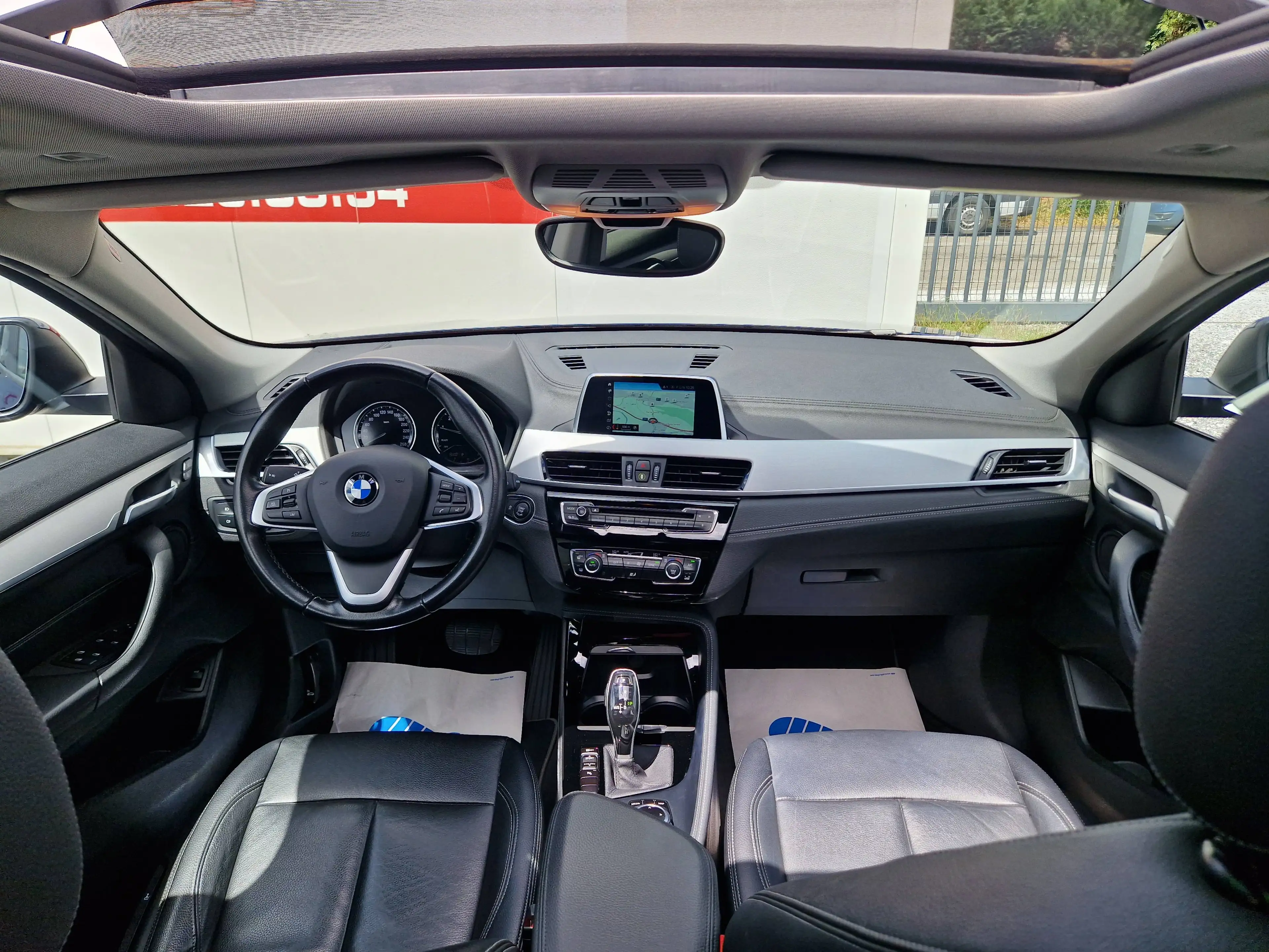 BMW X2 1.5iAS sDrive18*1°PROPRIO*CARNET*BOITE AUTO*TOIT PANO OUVRANT*CAMERA*GPS*CUIR — photo 7
