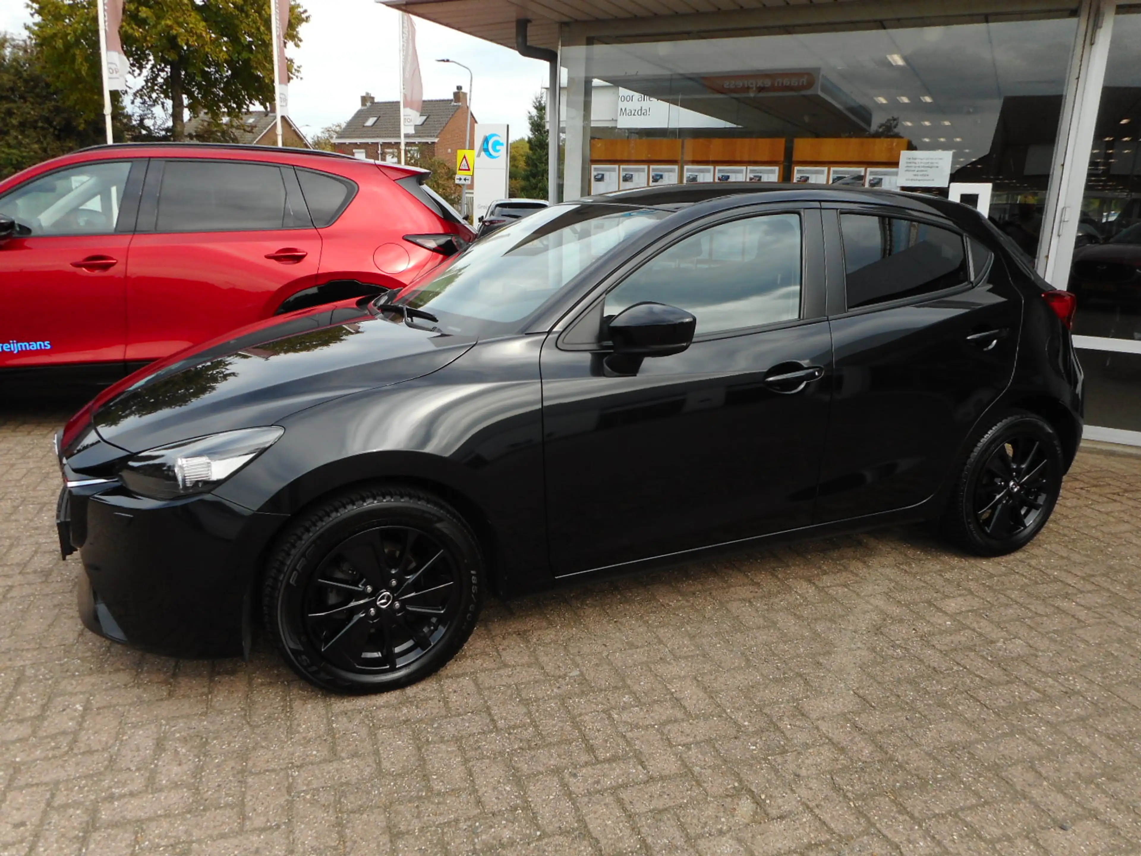 Mazda 2 1.5 e-SkyActiv-G 90 Homura — photo 3