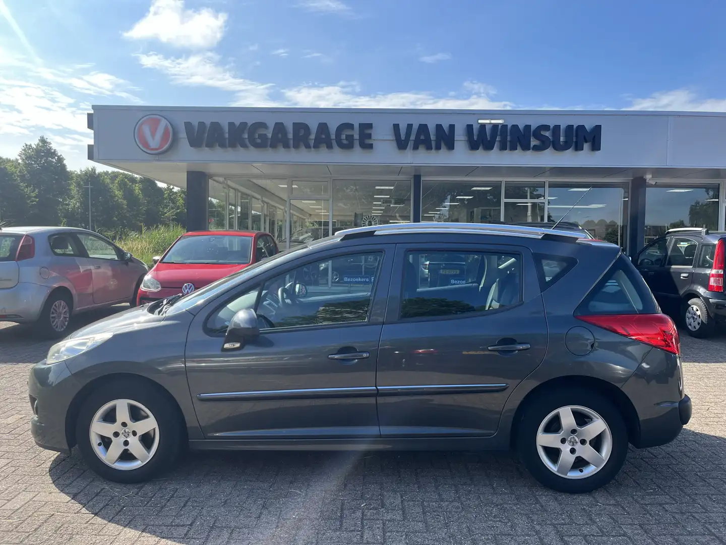 Peugeot 207 SW 1.4 VTi Style Cruise Lmv Nap Grijs - 2
