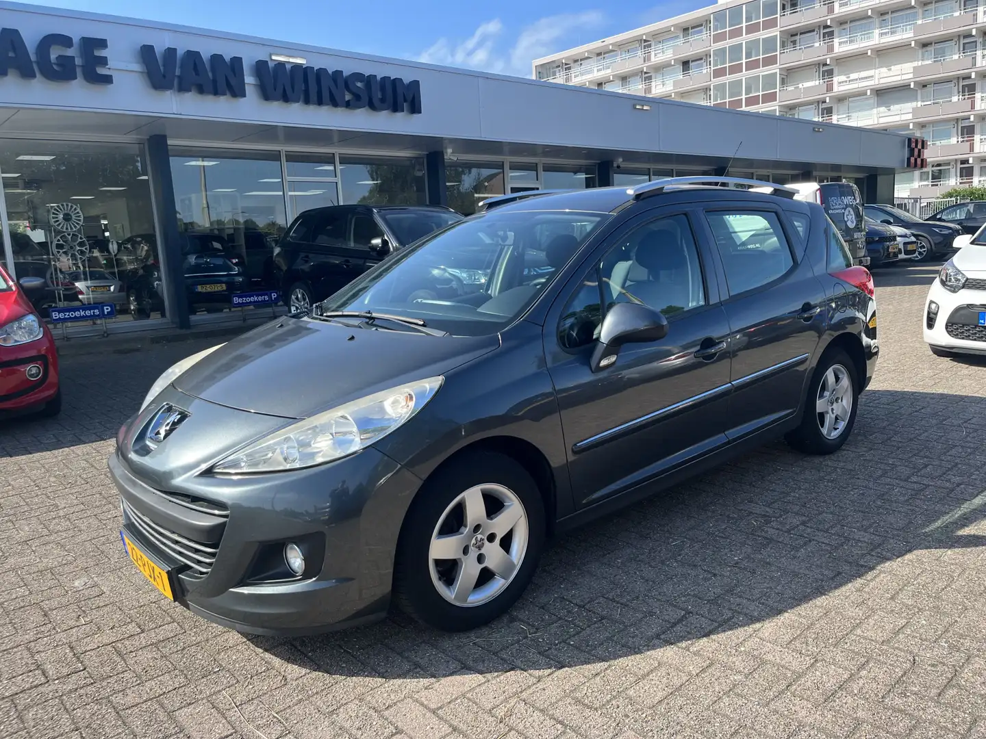 Peugeot 207 SW 1.4 VTi Style Cruise Lmv Nap Grijs - 1