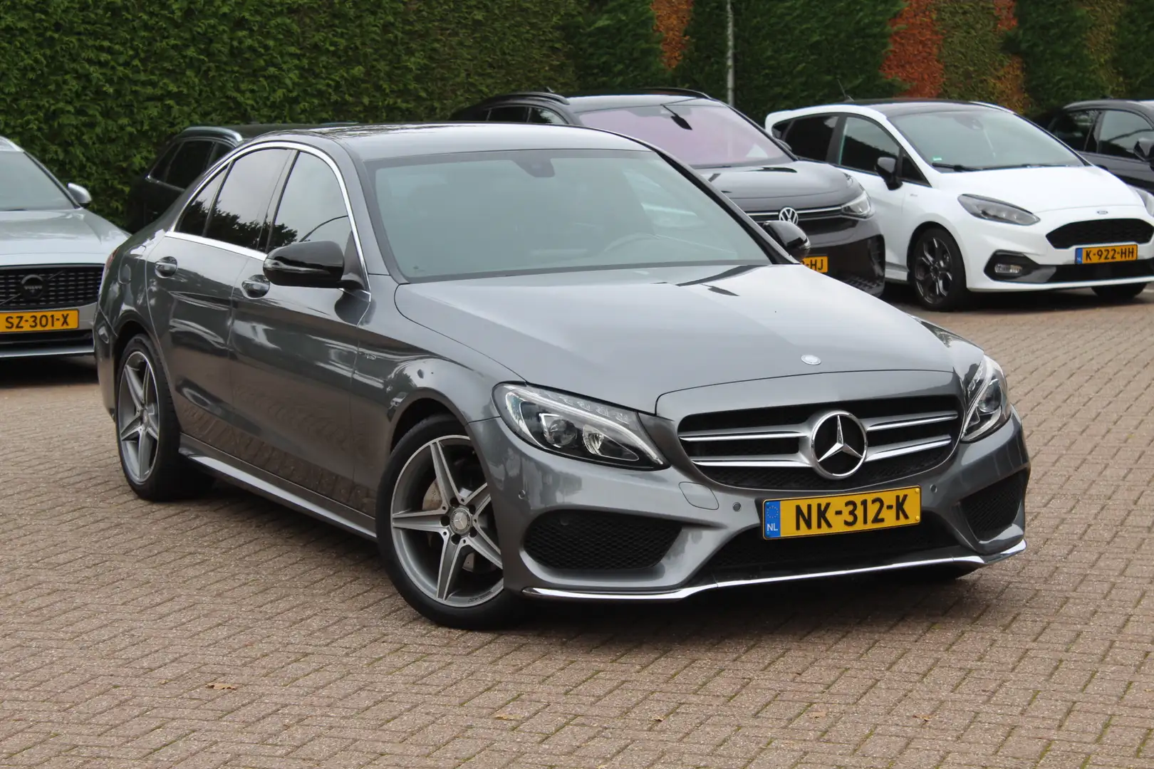 Mercedes-Benz C 180 AMG Sport Edition / Leder / Navigatie / Parkeerhul Gris - 1