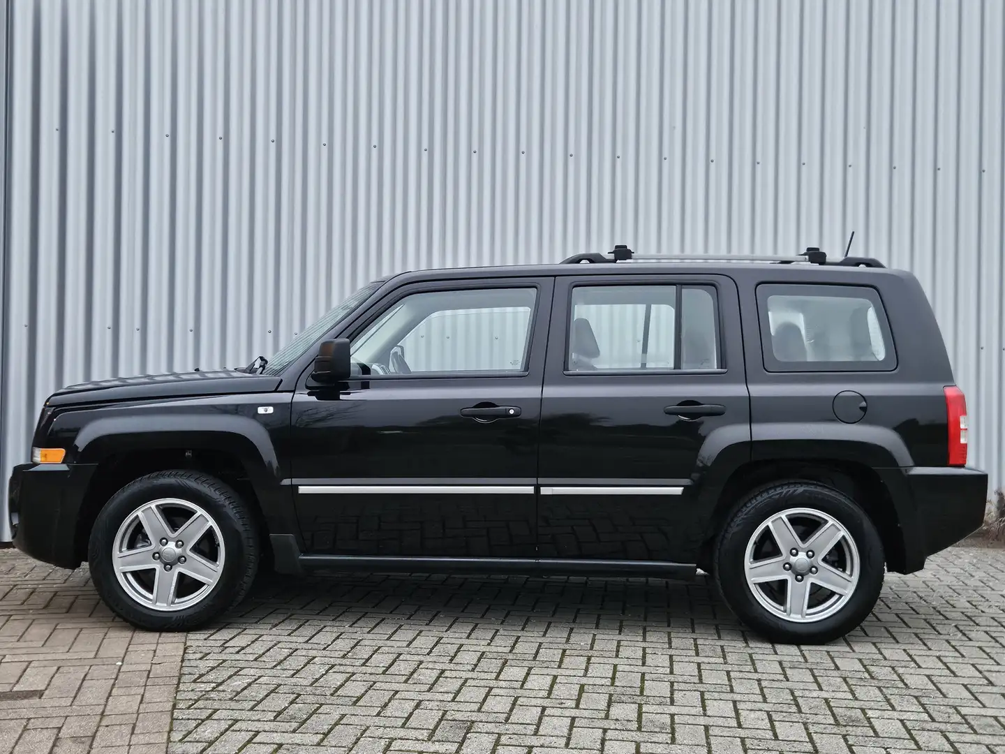 Jeep Patriot 2.4 Limited 4x4 /Automaat/Youngtimer/Cruise/Leer! Fekete - 2