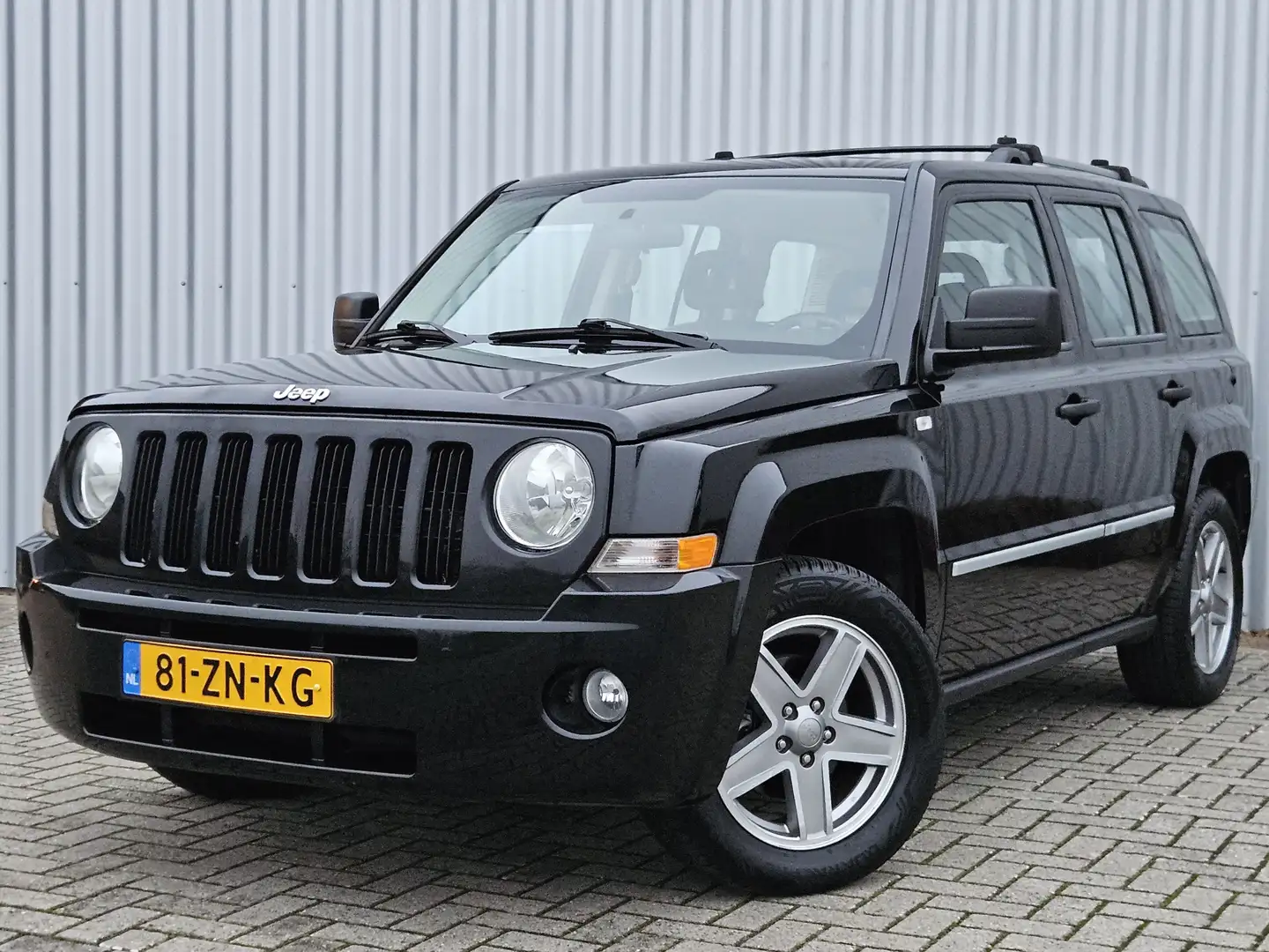 Jeep Patriot 2.4 Limited 4x4 /Automaat/Youngtimer/Cruise/Leer! Fekete - 1