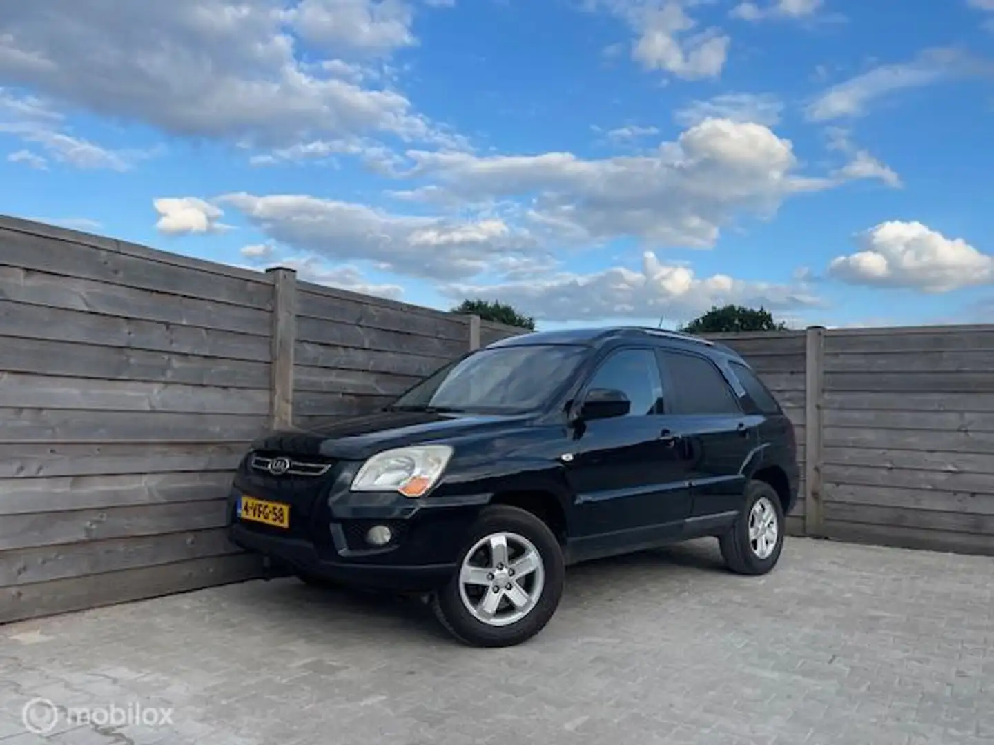 Kia Sportage 2.0 CRDI X-ecutive GrijsKenteken YoungT - 1