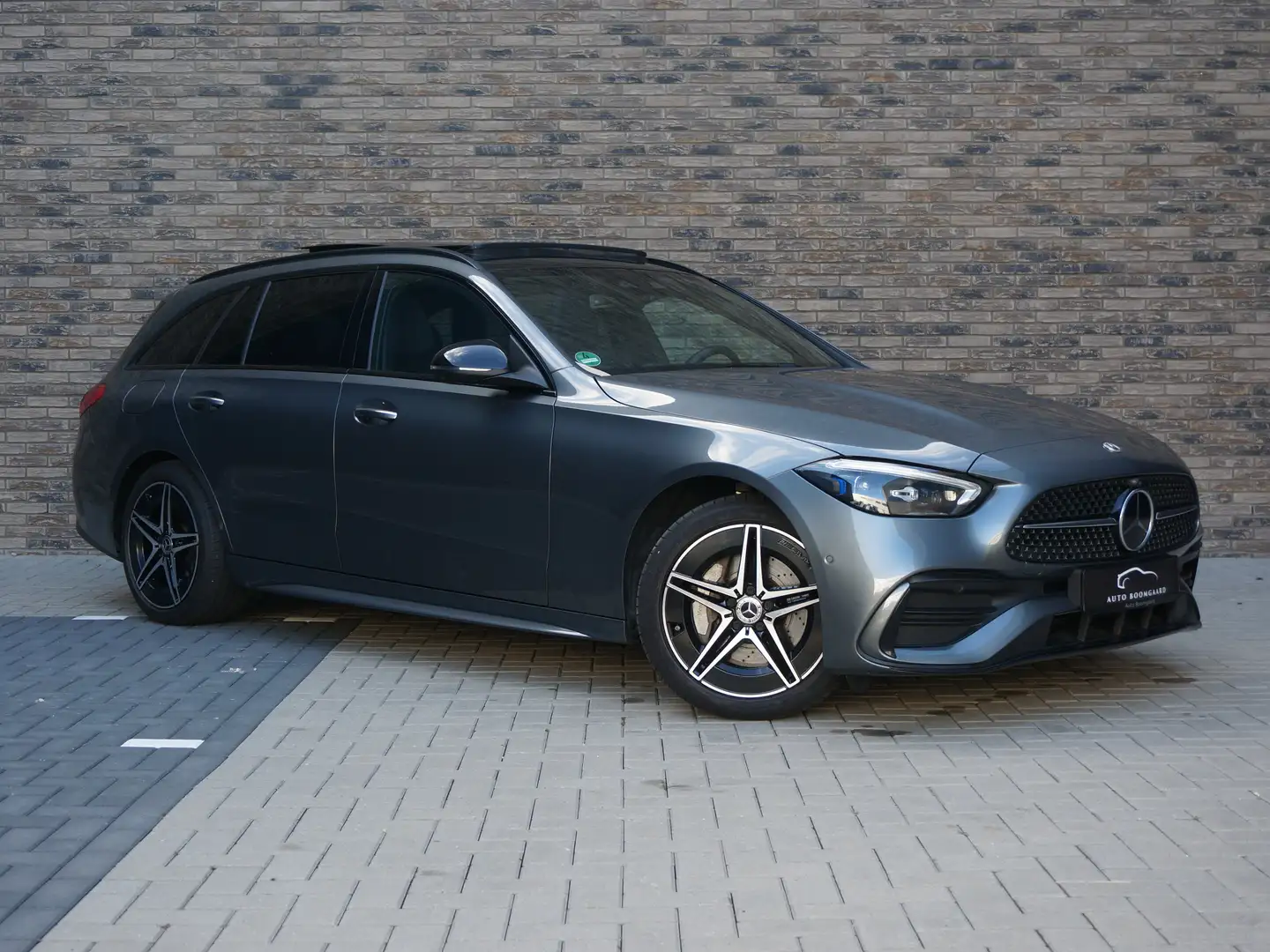 Mercedes-Benz C 300 e AMG | Panoramadak Trkhaak HeadUp 360'Cam. Memory Grijs - 1