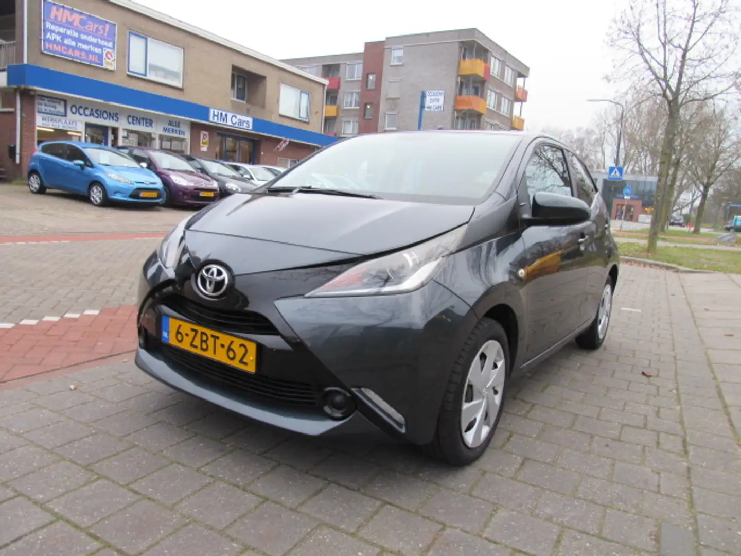Toyota Aygo 1.0 VVT-i 69pk 5DRS Airco/Cruise x-play Gris - 1