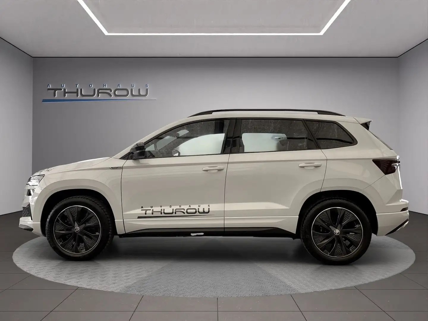 Skoda Karoq 2.0 TSI Sportline 4x4 DSG AppCn AHK LED SH Weiß - 2