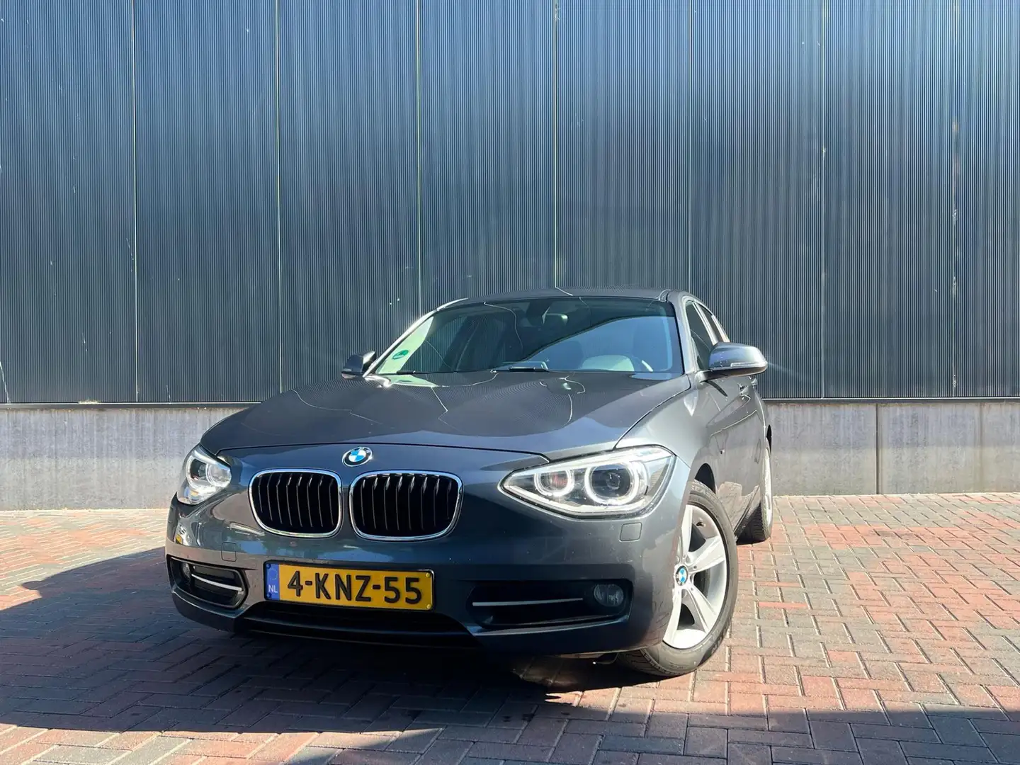 BMW 116 1-serie 116i EDE Executive Sport * Cruise * Navi * Grigio - 1