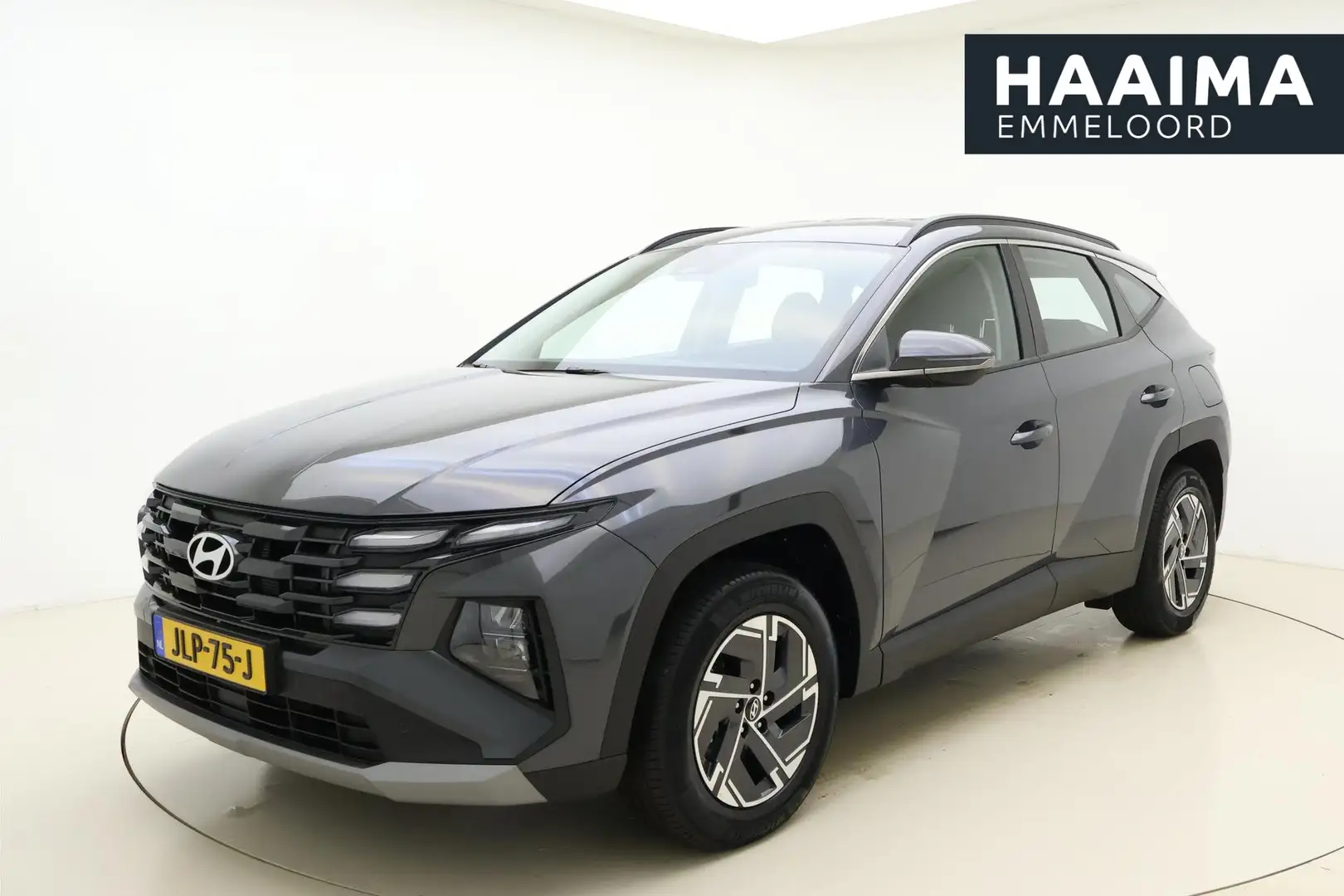 Hyundai TUCSON 1.6 T-GDI PHEV i-Motion 250 PK Automaat | NIEUW! | Grijs - 1