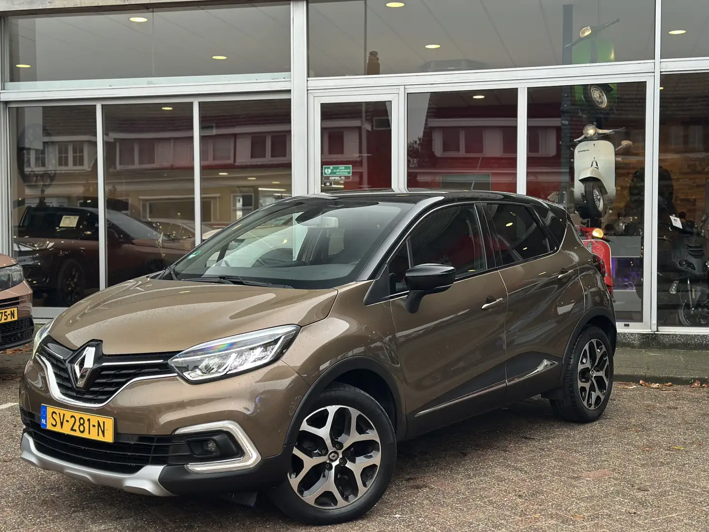 Renault Captur 0.9 TCe Intens Panorama dak/Trekhaak/Navi/Camera. Brun - 1