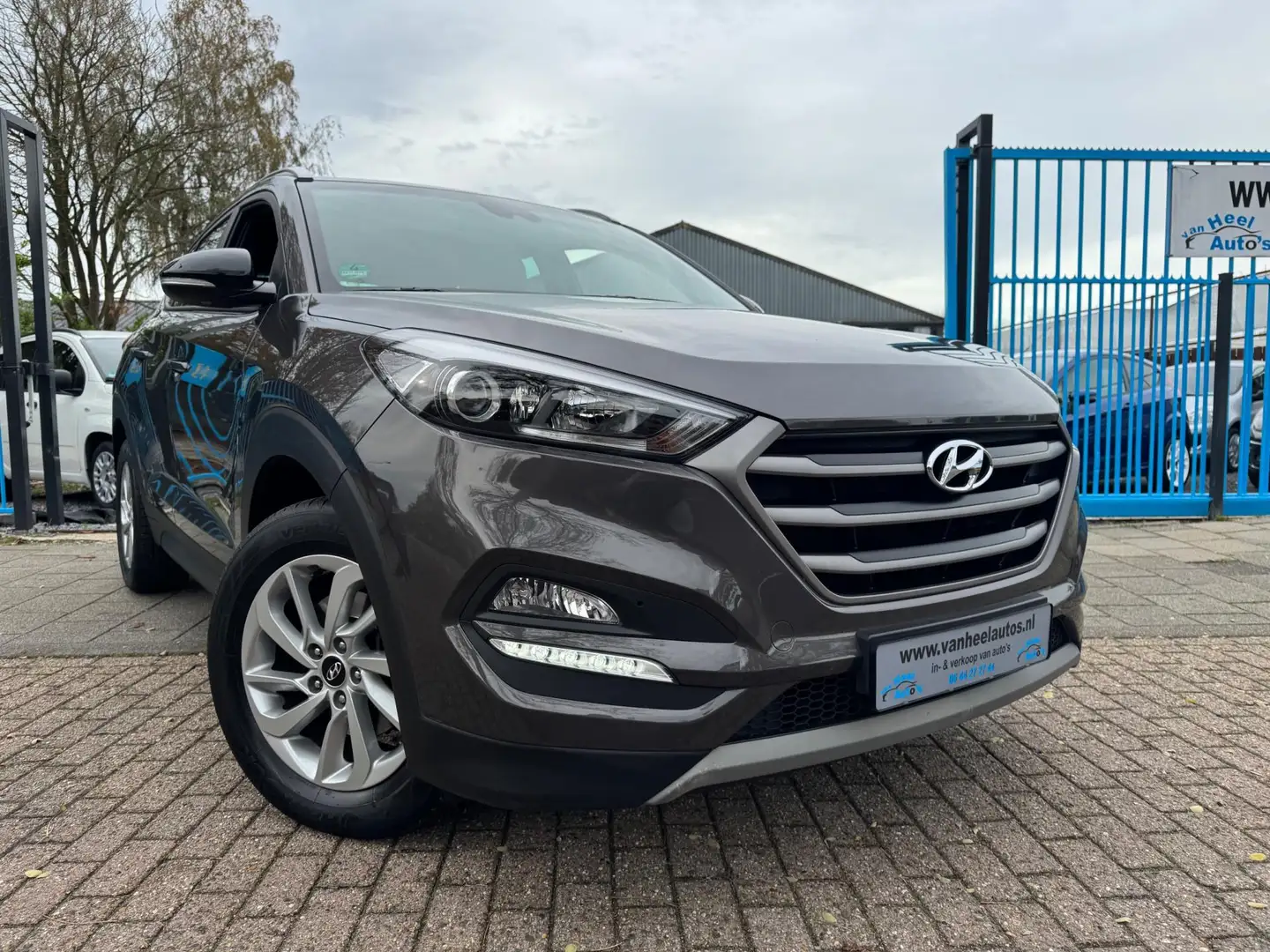 Hyundai TUCSON 1.6 GDi Comfort Clima Elek Pakket Navi Cruise Lmv Grijs - 2