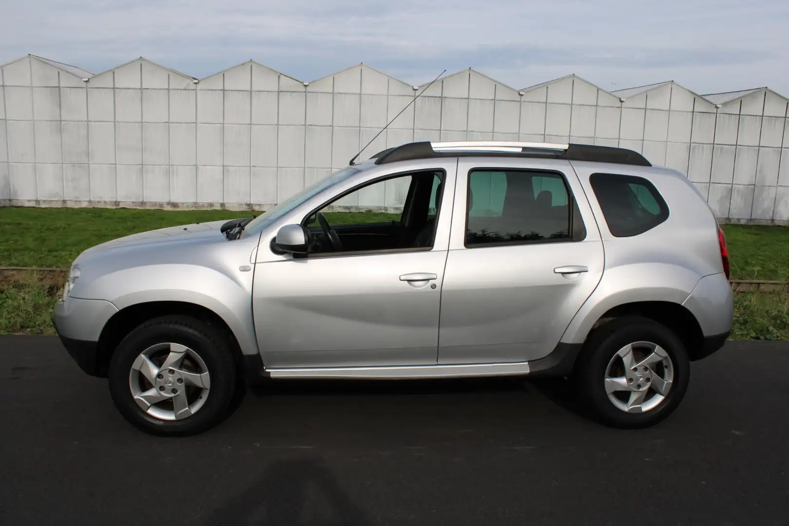 Dacia Duster 1.6 Aniversare met Leder en Airco Grijs - 2