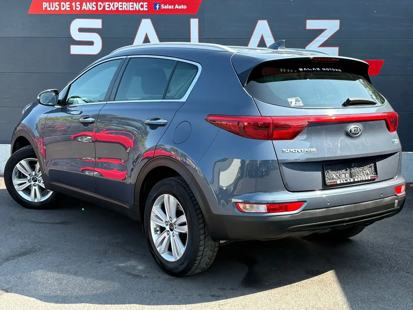 Kia Sportage 1.6i 2WD Fusion/ESSENCE/CLIM/CAMERA/NAVI Grijs - 2