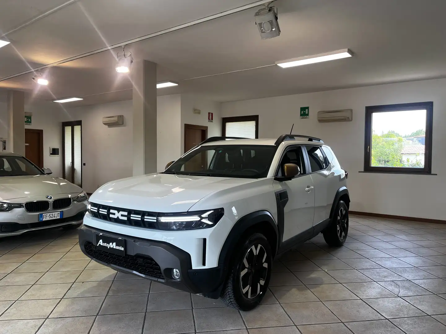 Dacia Duster Duster 1.2 mild hybrid Extreme 4x4 130cv Weiß - 1