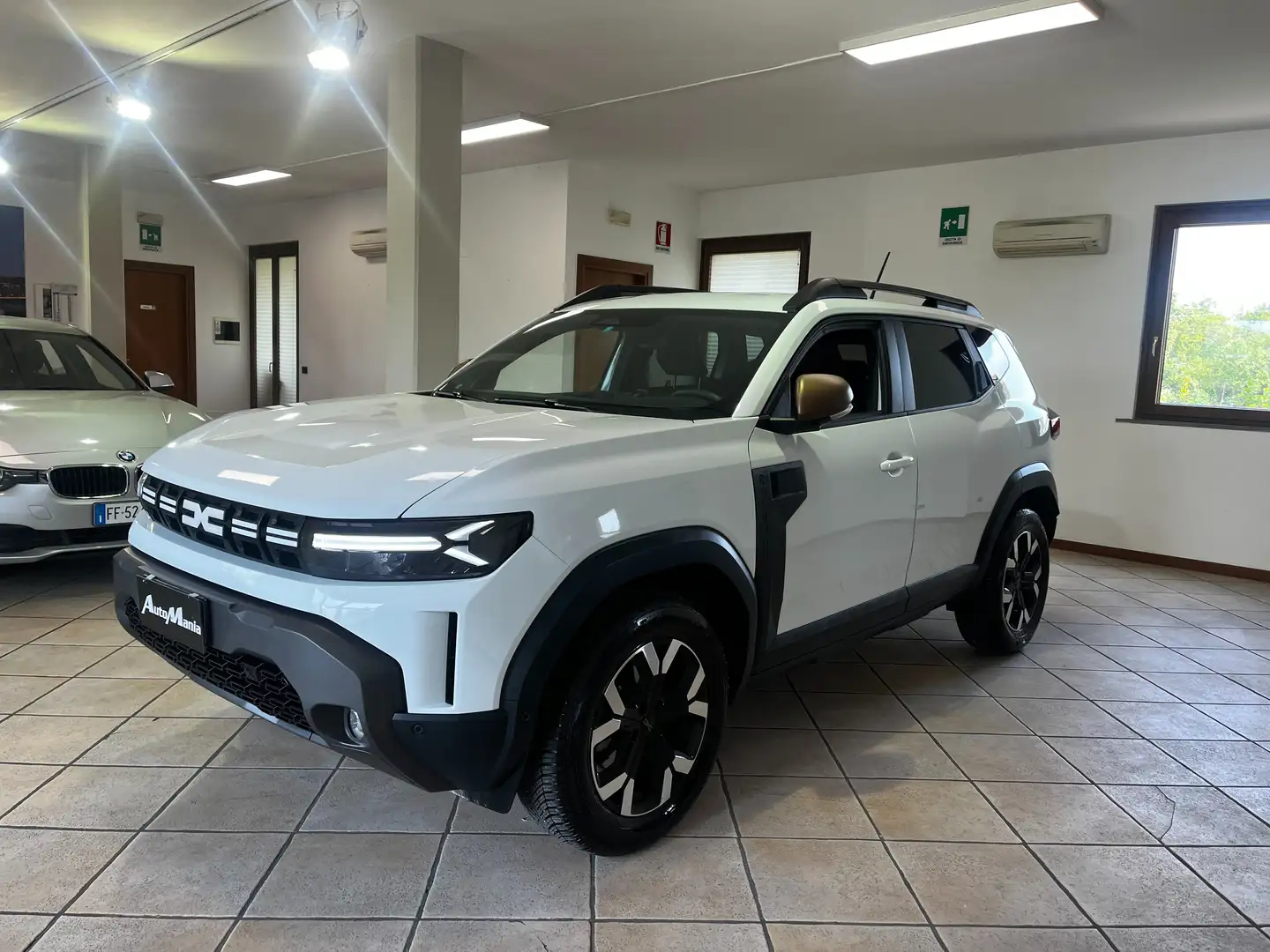 Dacia Duster Duster 1.2 mild hybrid Extreme 4x4 130cv Weiß - 2