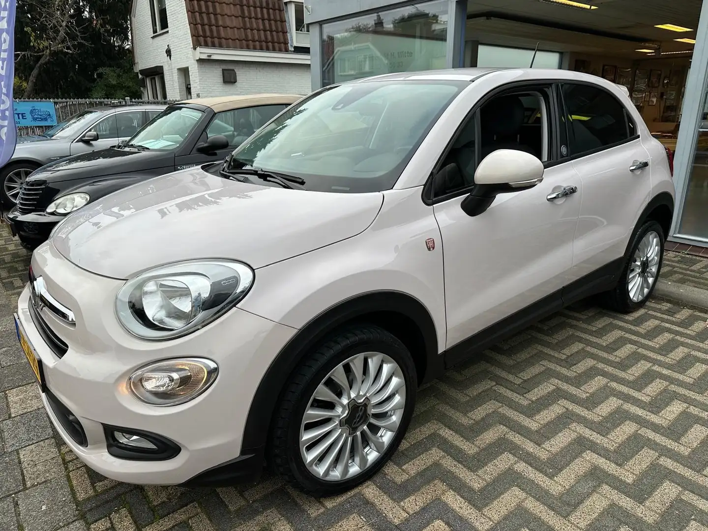 Fiat 500X 1.4 T M-Air Opening Edition Ned. Auto Grijs - 1