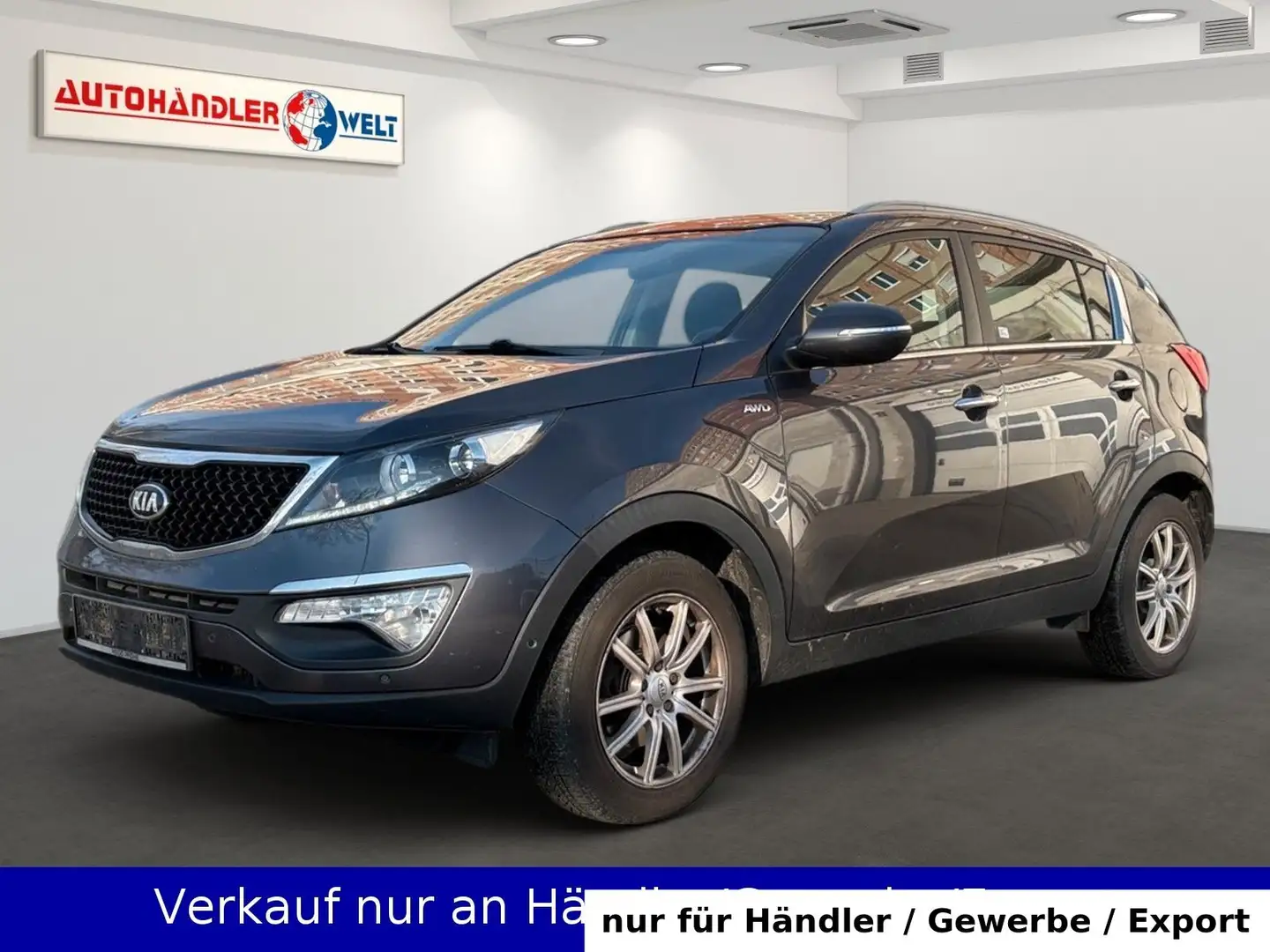 Kia Sportage 2.0 CRDI 4WD 1.Hand AAC SHZ Navi PDC Grau - 1