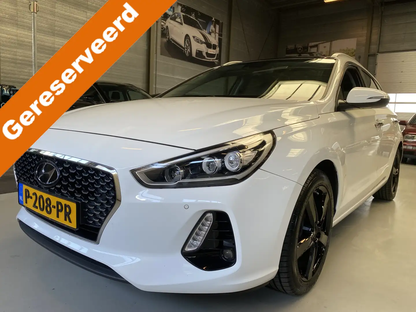 Hyundai i30 Wagon 1.4 T-GDI Comfort Adaptive Cruise, Panorama, Wit - 1