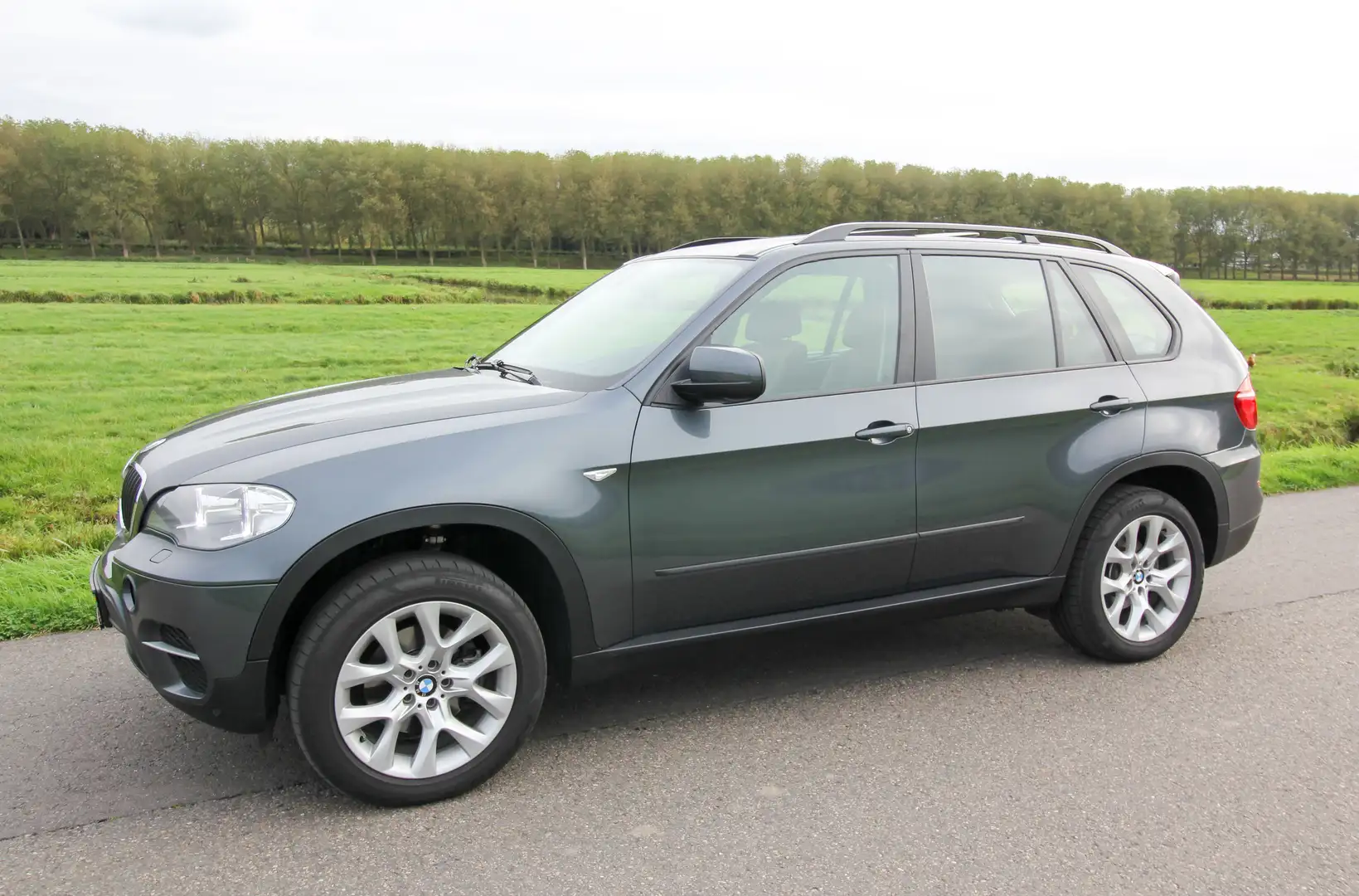BMW X5 xDrive30d High Exec. Euro 5 & Youngtimer Panorama Grijs - 1