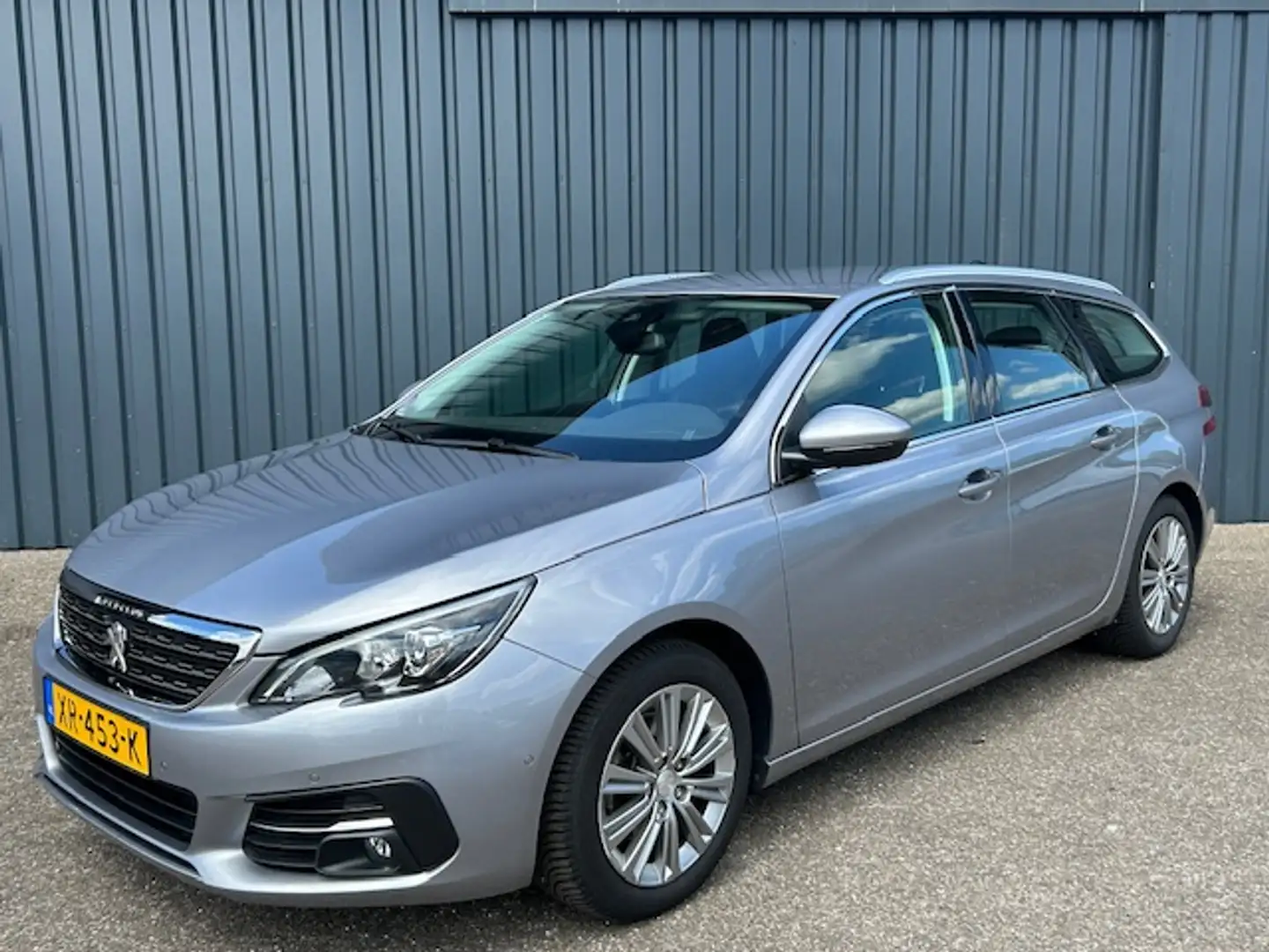Peugeot 308 1.2 PureTech 130pk Aut. Style | Clima | Navi | Pdc Grijs - 1