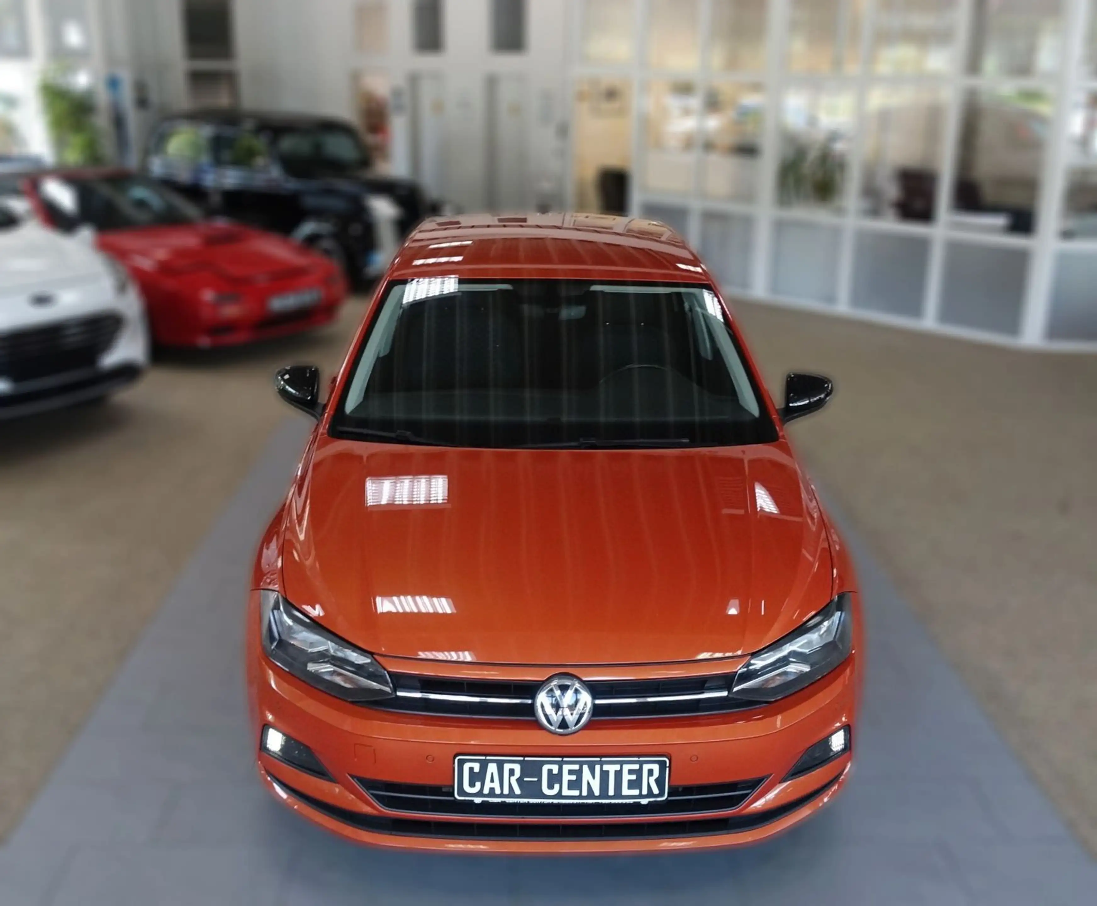 Volkswagen Polo VI IQ.DRIVE "ENERGETIC ORANGE" — photo 5