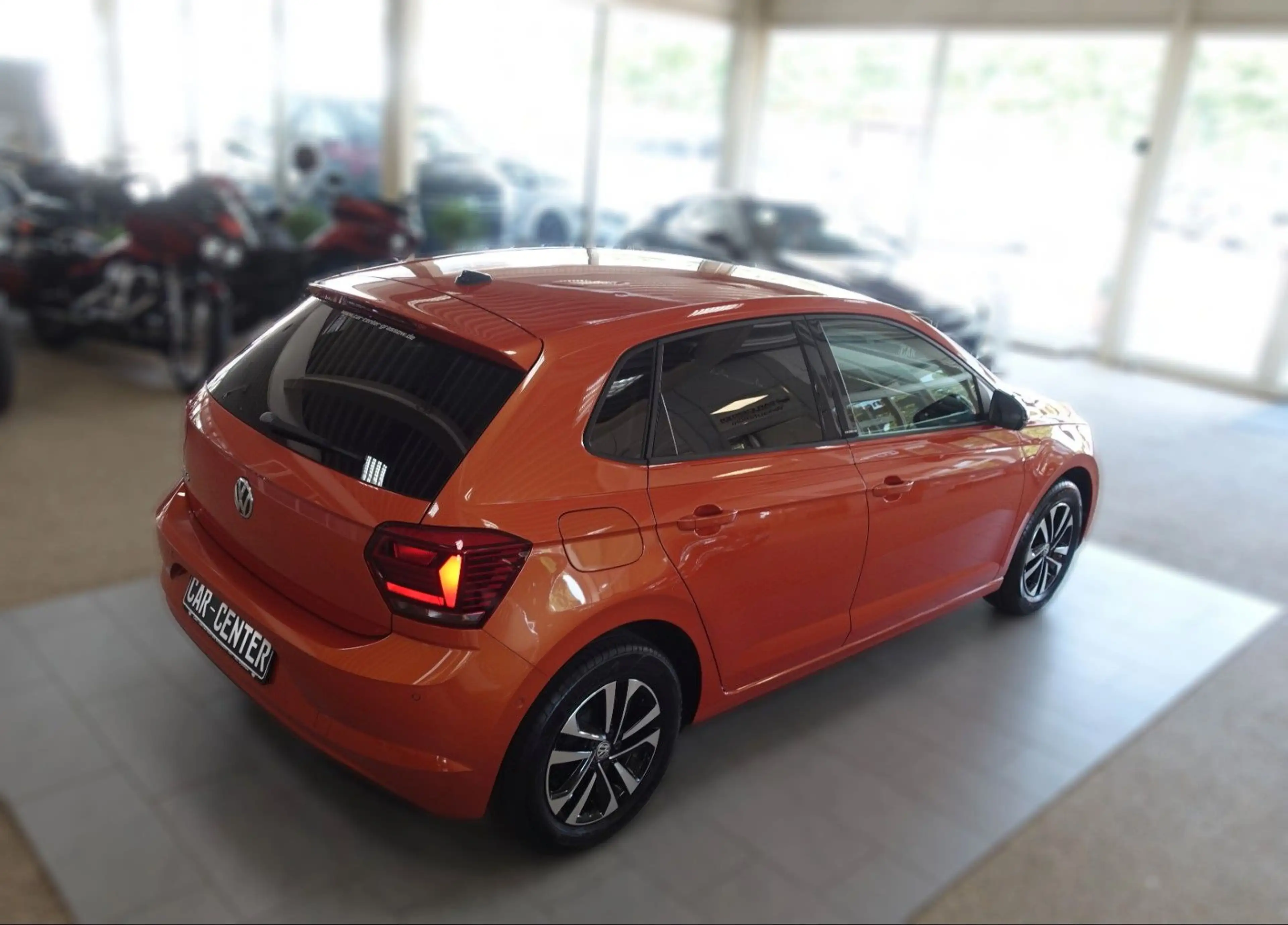 Volkswagen Polo VI IQ.DRIVE "ENERGETIC ORANGE" — photo 14