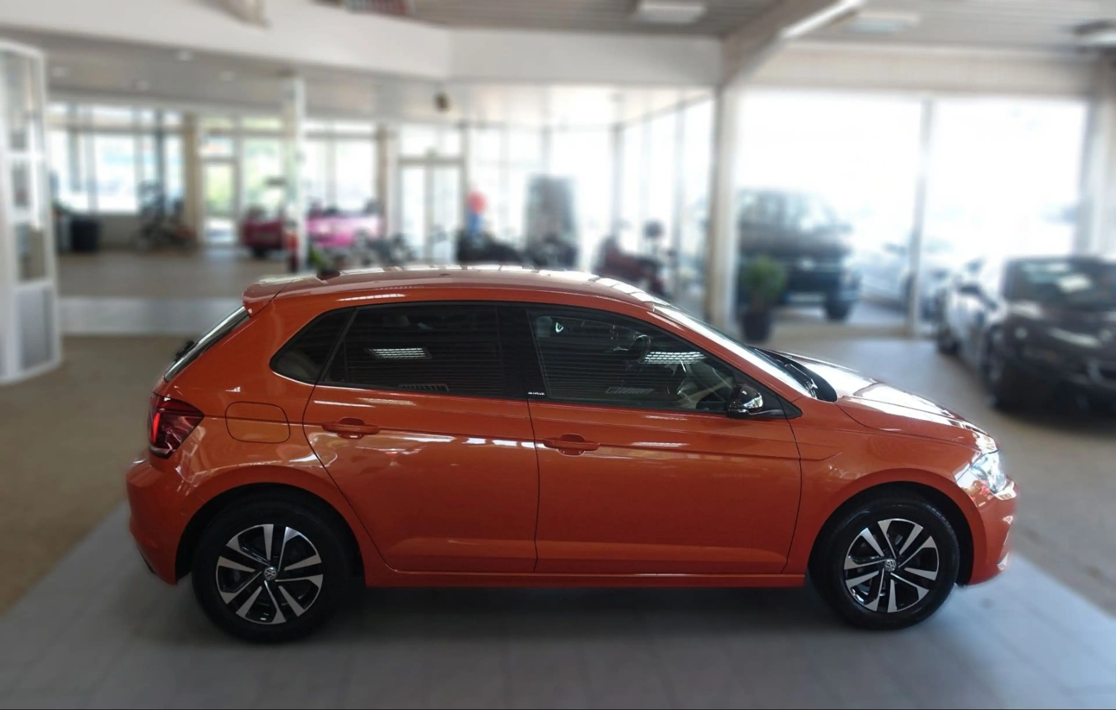 Volkswagen Polo VI IQ.DRIVE "ENERGETIC ORANGE" — photo 15