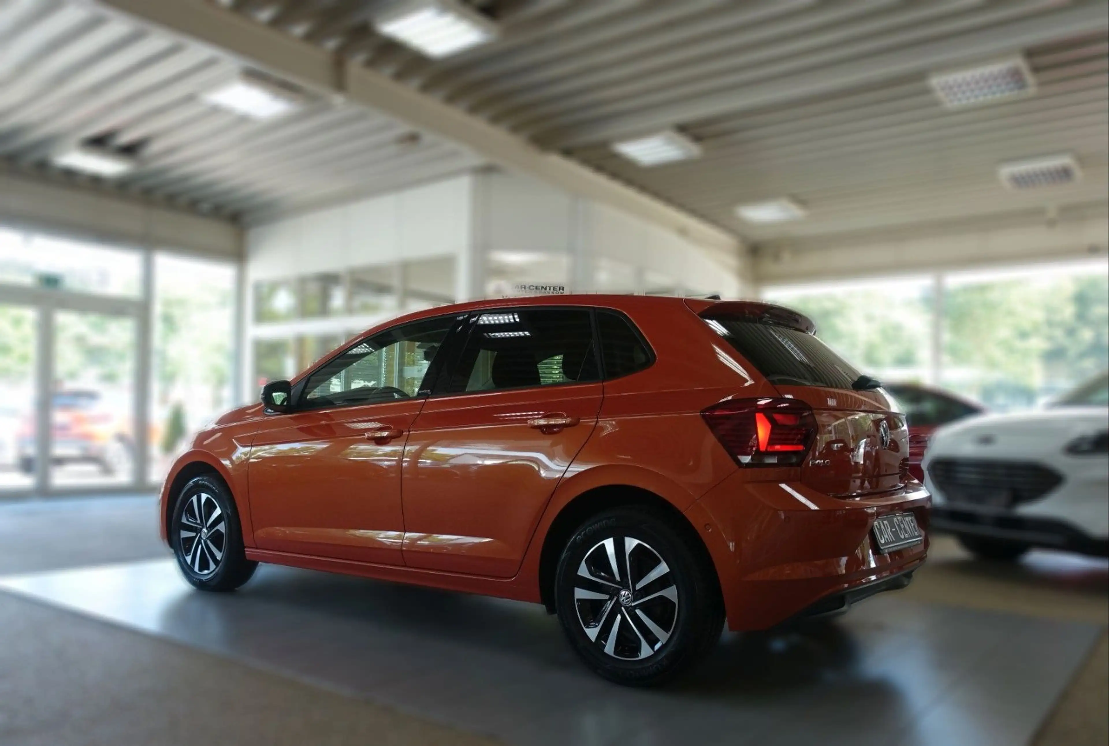 Volkswagen Polo VI IQ.DRIVE "ENERGETIC ORANGE" — photo 9