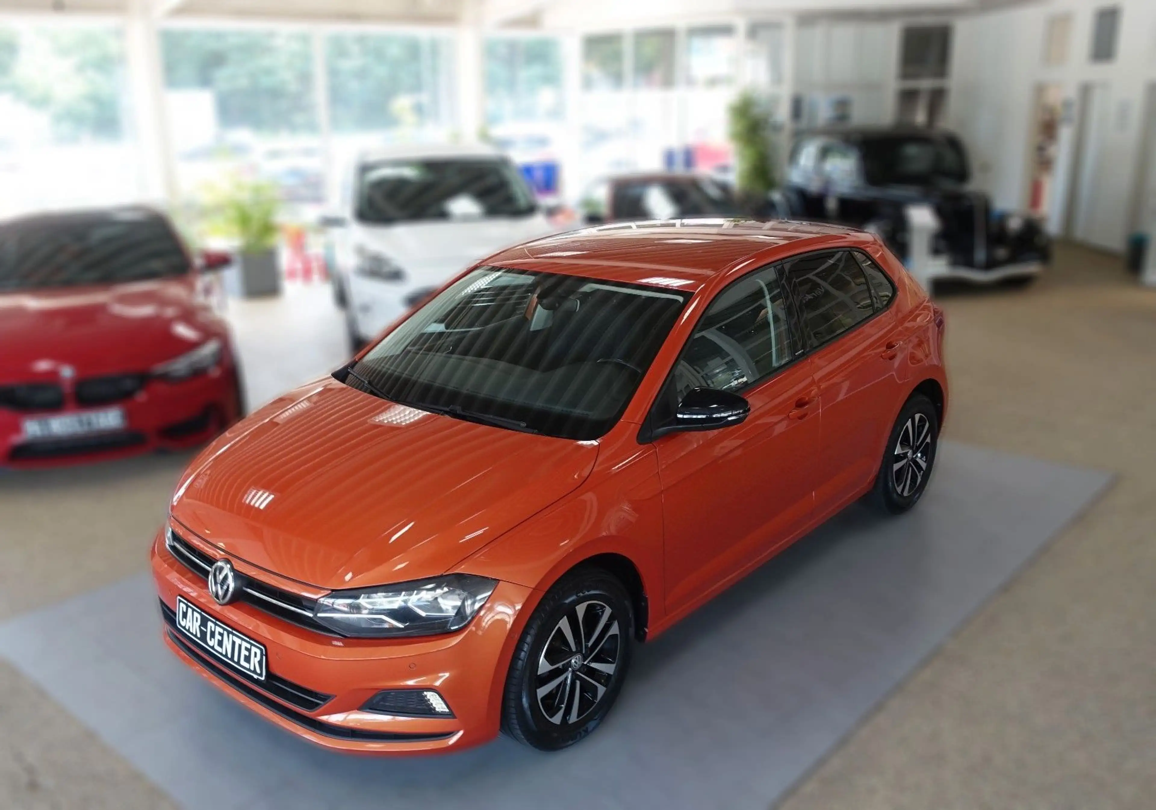 Volkswagen Polo VI IQ.DRIVE "ENERGETIC ORANGE" — photo 7
