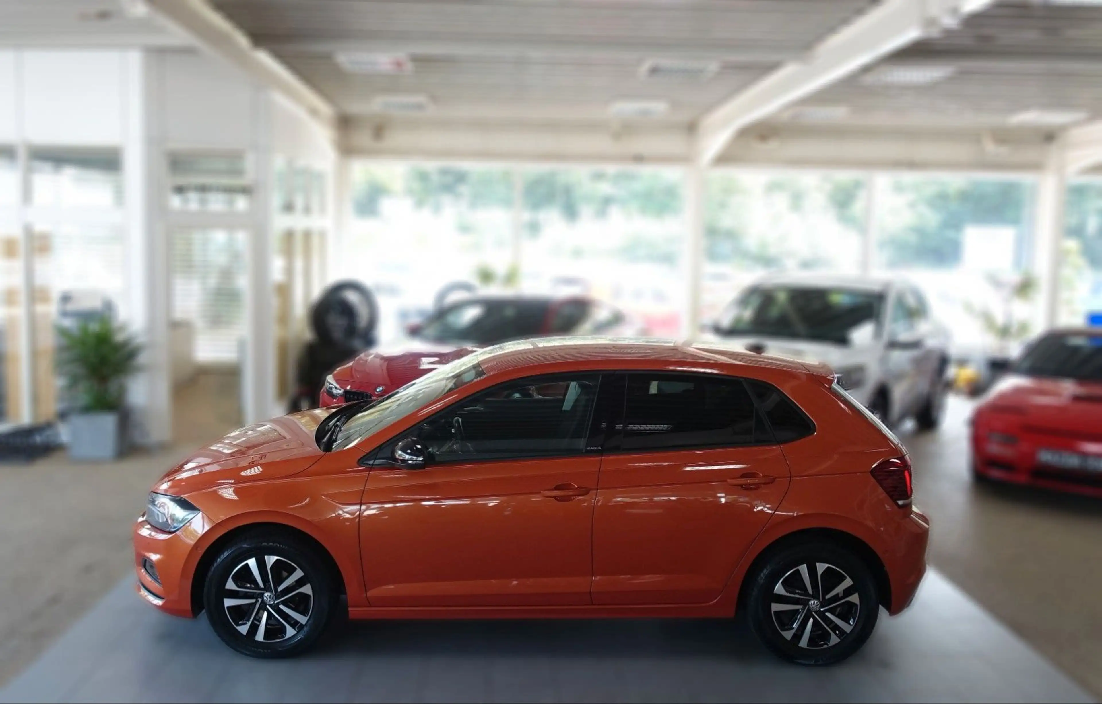 Volkswagen Polo VI IQ.DRIVE "ENERGETIC ORANGE" — photo 8