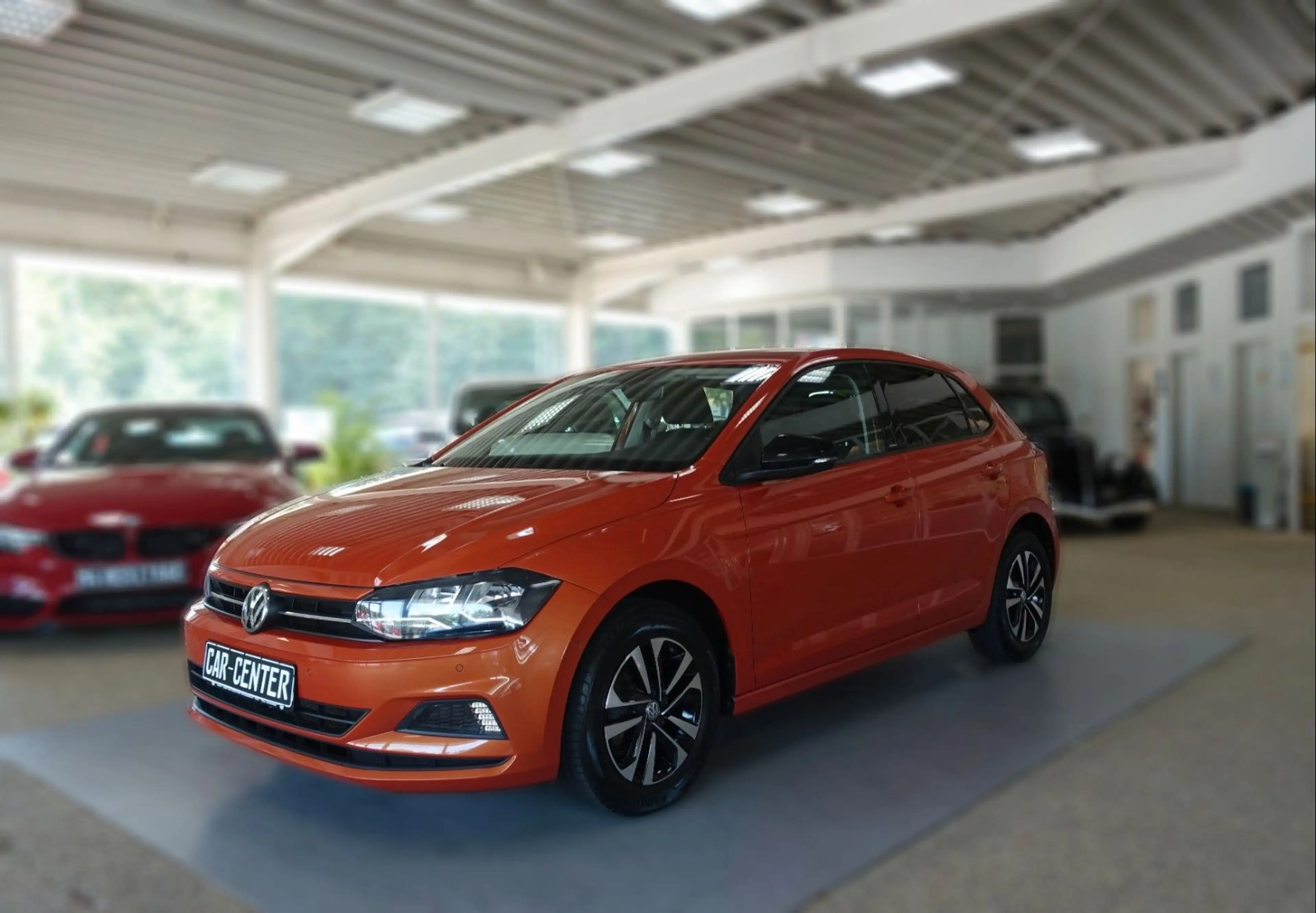 Volkswagen Polo VI IQ.DRIVE "ENERGETIC ORANGE" — photo 6