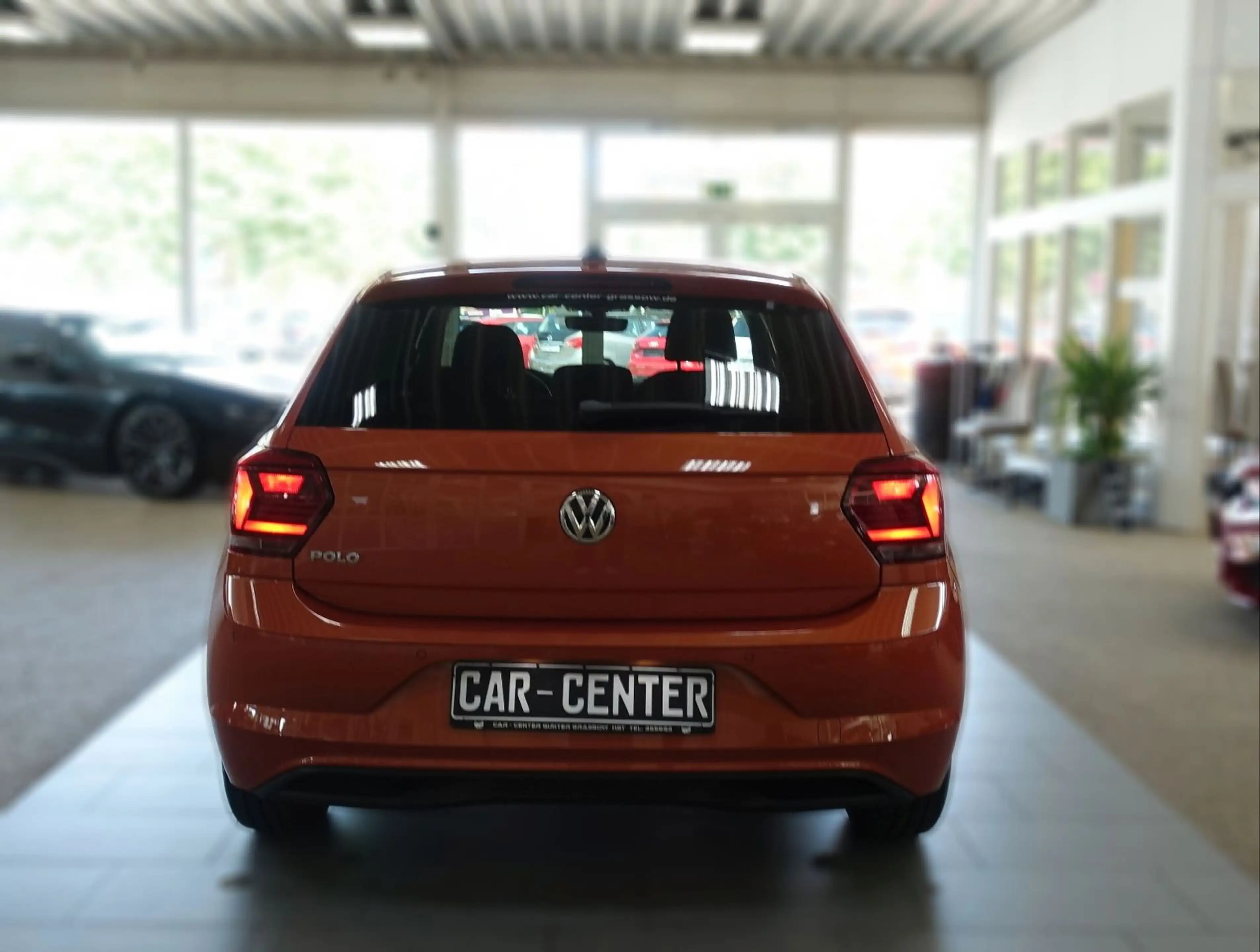 Volkswagen Polo VI IQ.DRIVE "ENERGETIC ORANGE" — photo 11