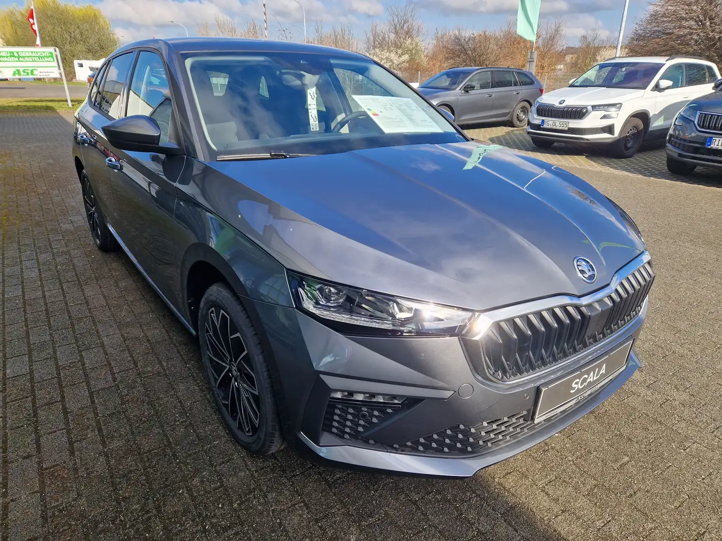 Skoda Scala Tour 1.0 TSI DSG 85 kW/RFK/BFS/ACC/PDC/Navi Grigio - 1