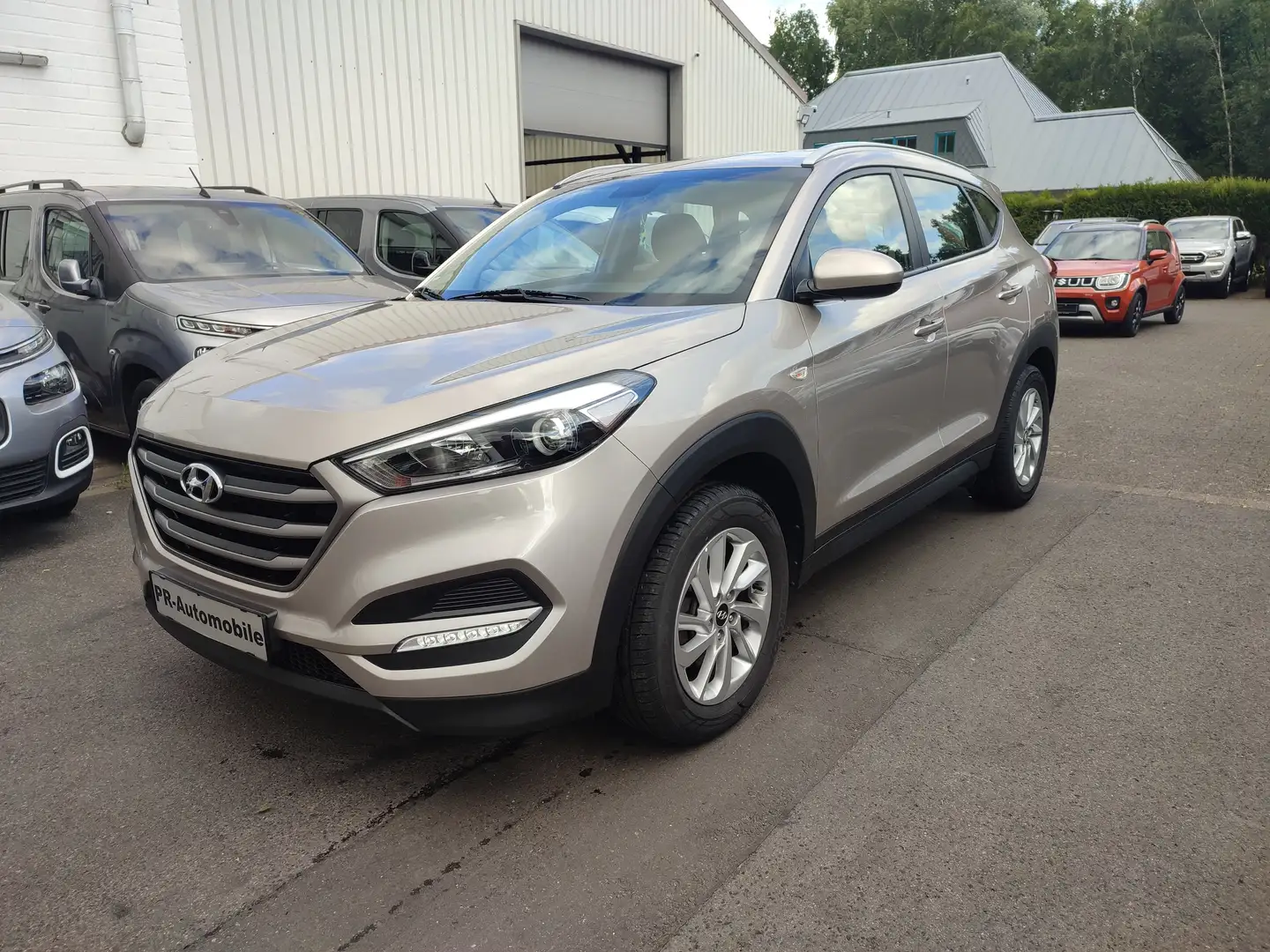 Hyundai TUCSON 1.6 Turbo Klima/Alu/AHK/Navi+Cam Beige - 1