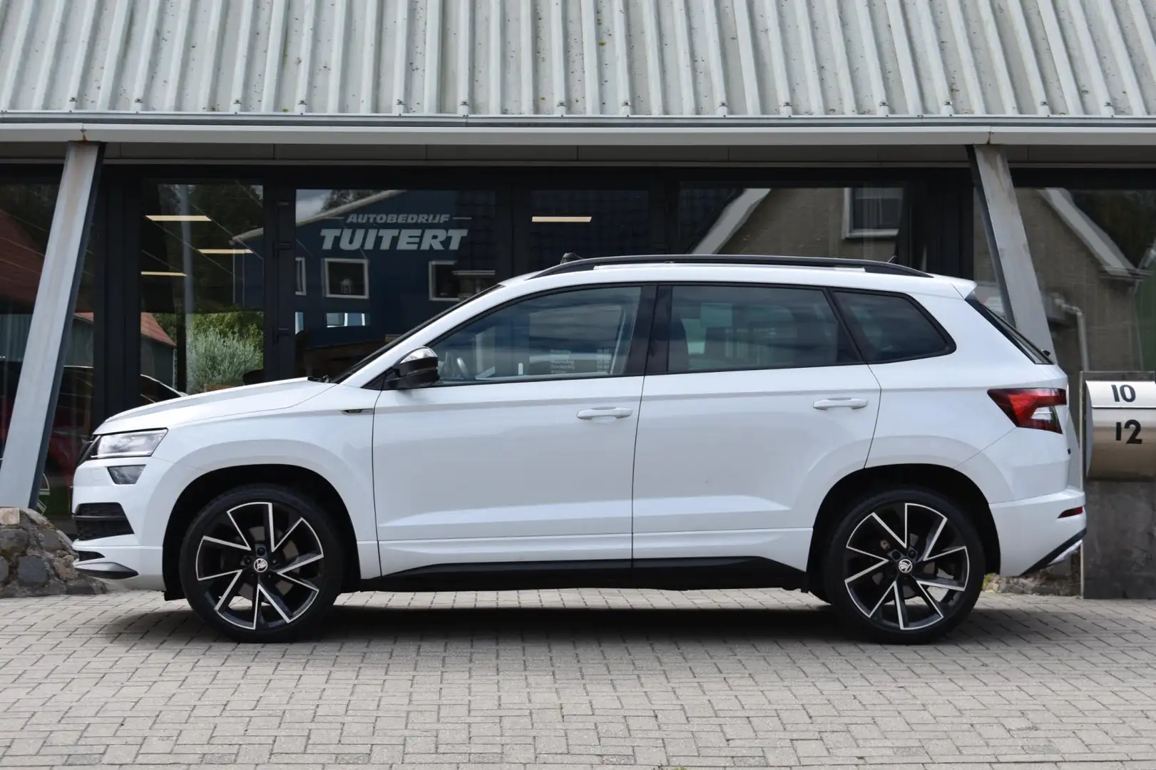 Skoda Karoq 1.5 TSI ACT Sportline | PANORAMADAK | CANTON | DEA Blanc - 2