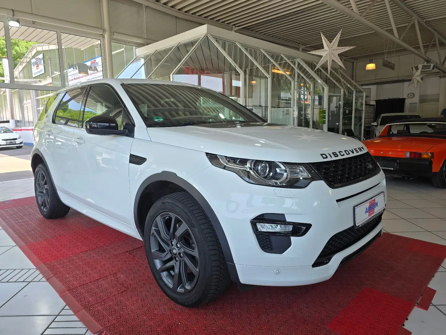 Land Rover Discovery Sport +NAVI+KAMERA+LEDER+MERIDIAN+ Wit - 1