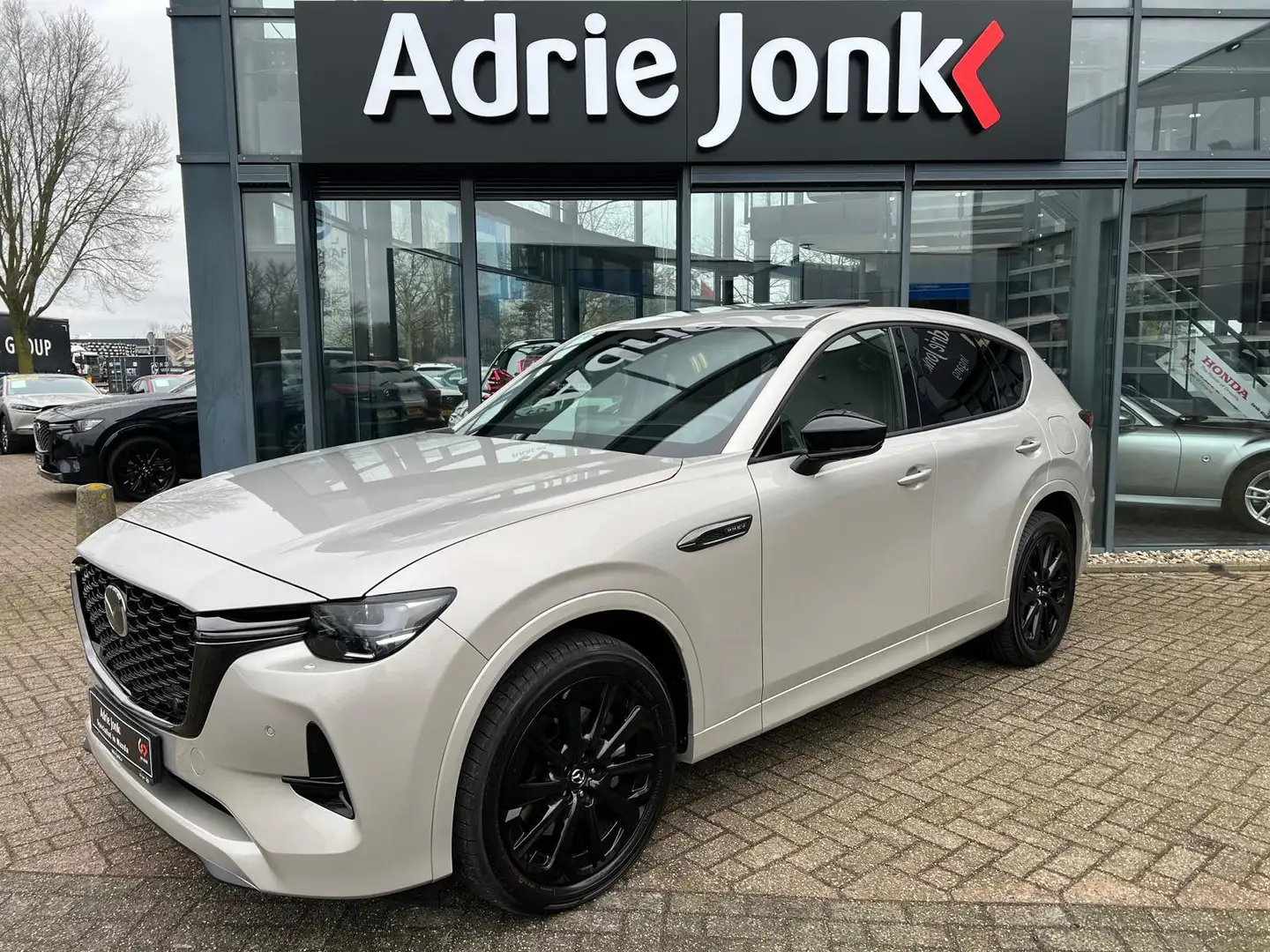 Mazda CX-60 2.5 e-SkyActiv PHEV Homura Plus AUTOMAAT | PLUG-IN Braun - 2