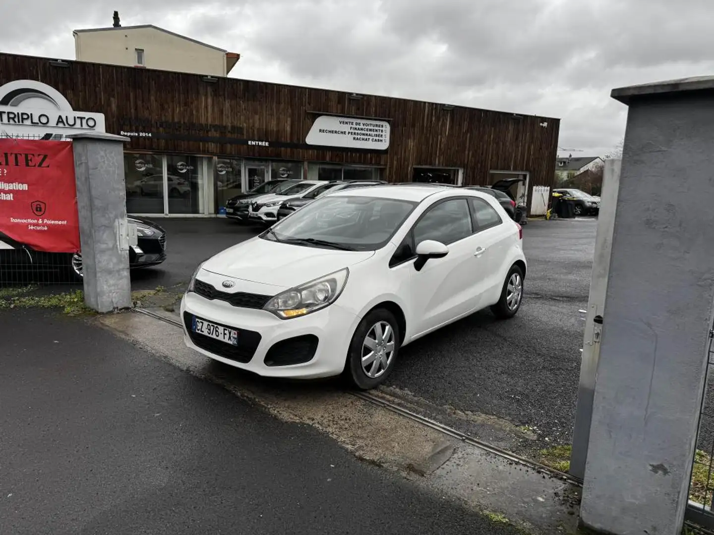 Kia Rio Rio 1.2i - 85 Motion Blanc - 1